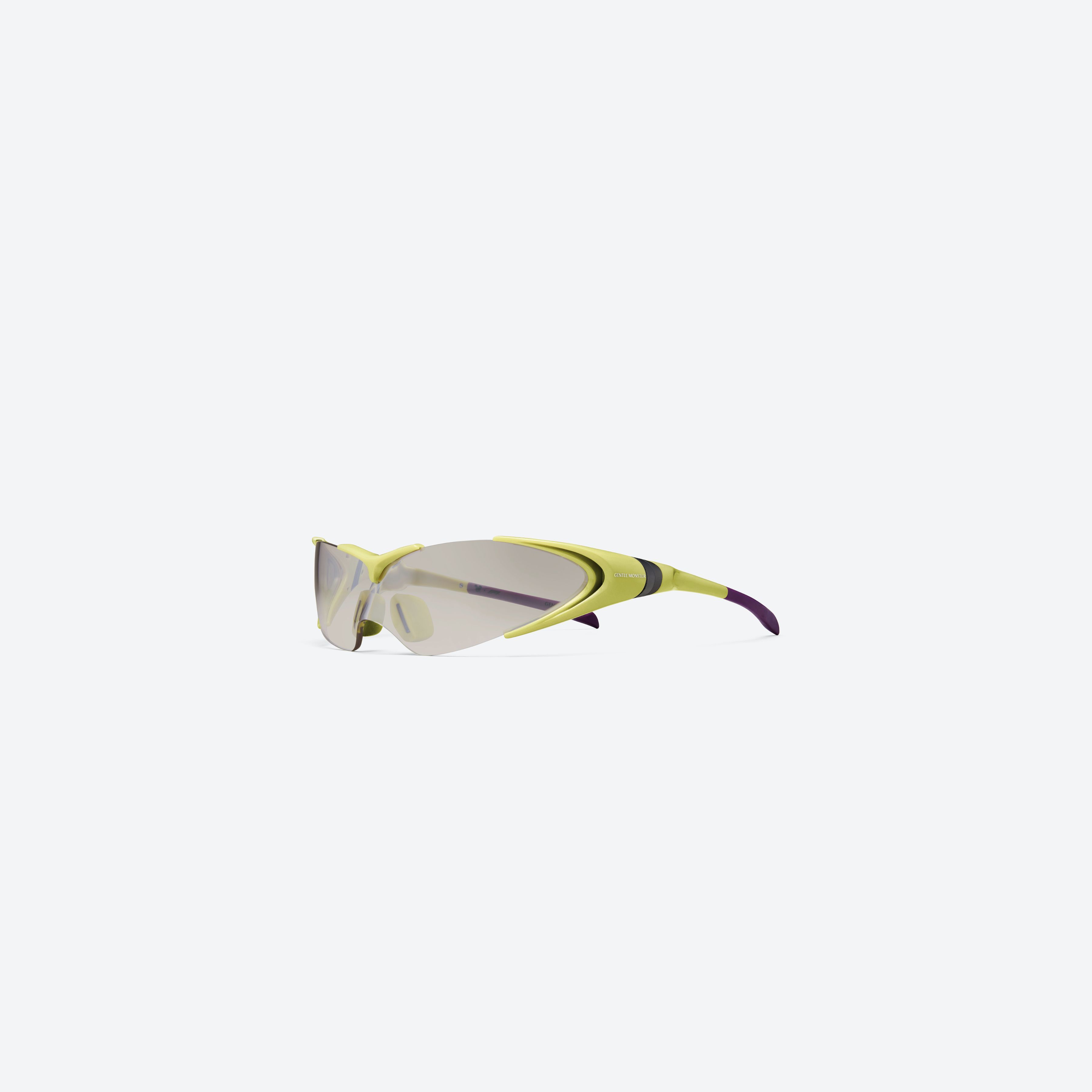 45-degree view of Gentle Monster Disney F1 - Aero GR13 Green Nylon framed Wraparound sunglasses.