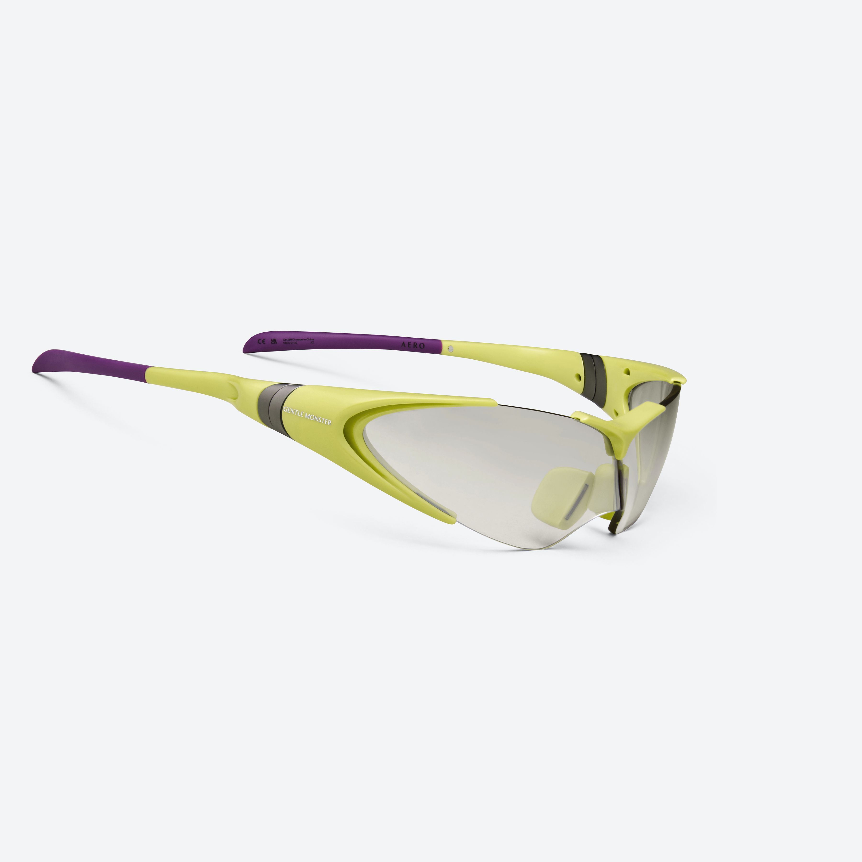 45-degree detailed view of Gentle Monster Disney F1 - Aero GR13 Green Nylon framed Wraparound sunglasses.
