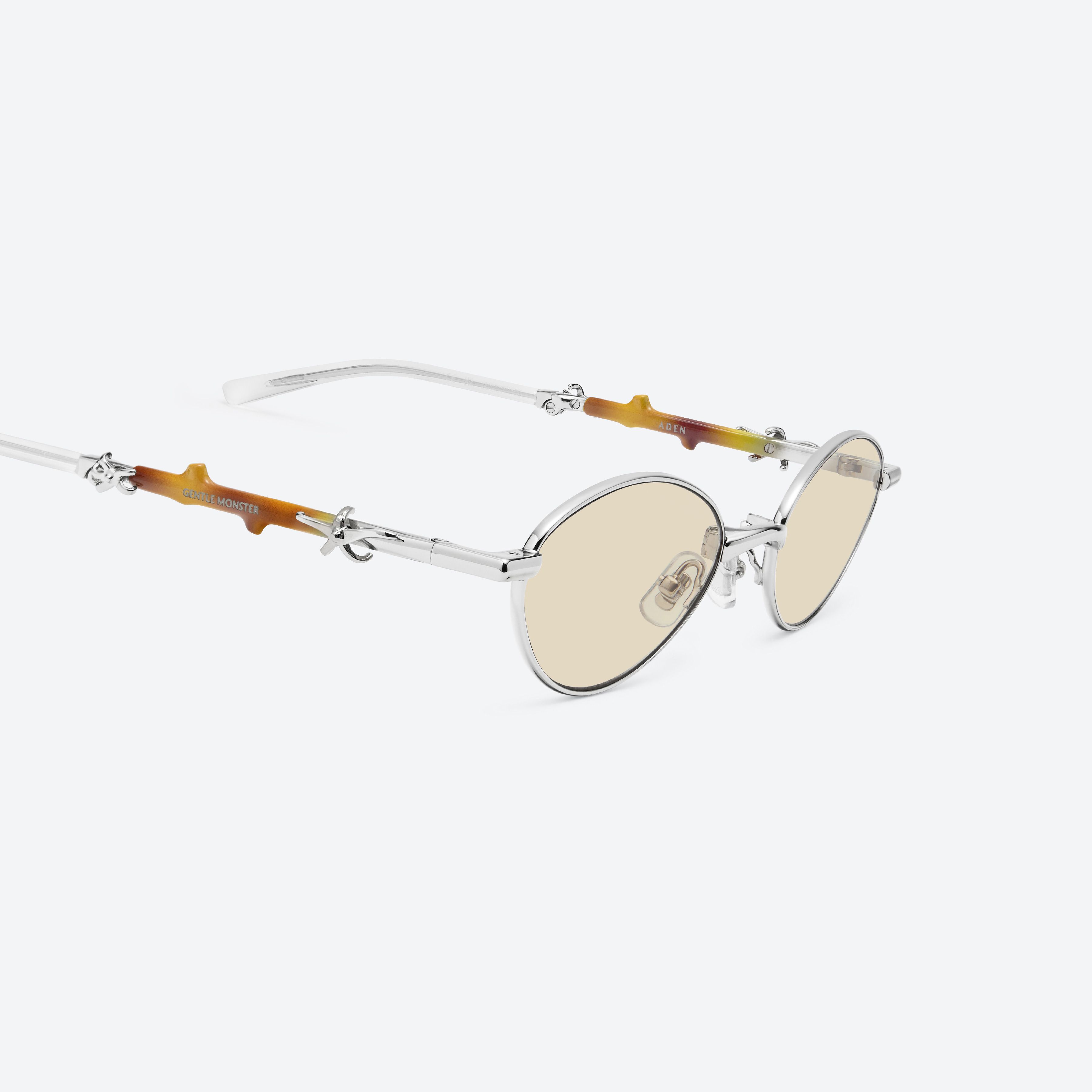 45-degree detailed view of Gentle Monster Aden 02(Y) Silver Metal framed Oval sunglasses.
