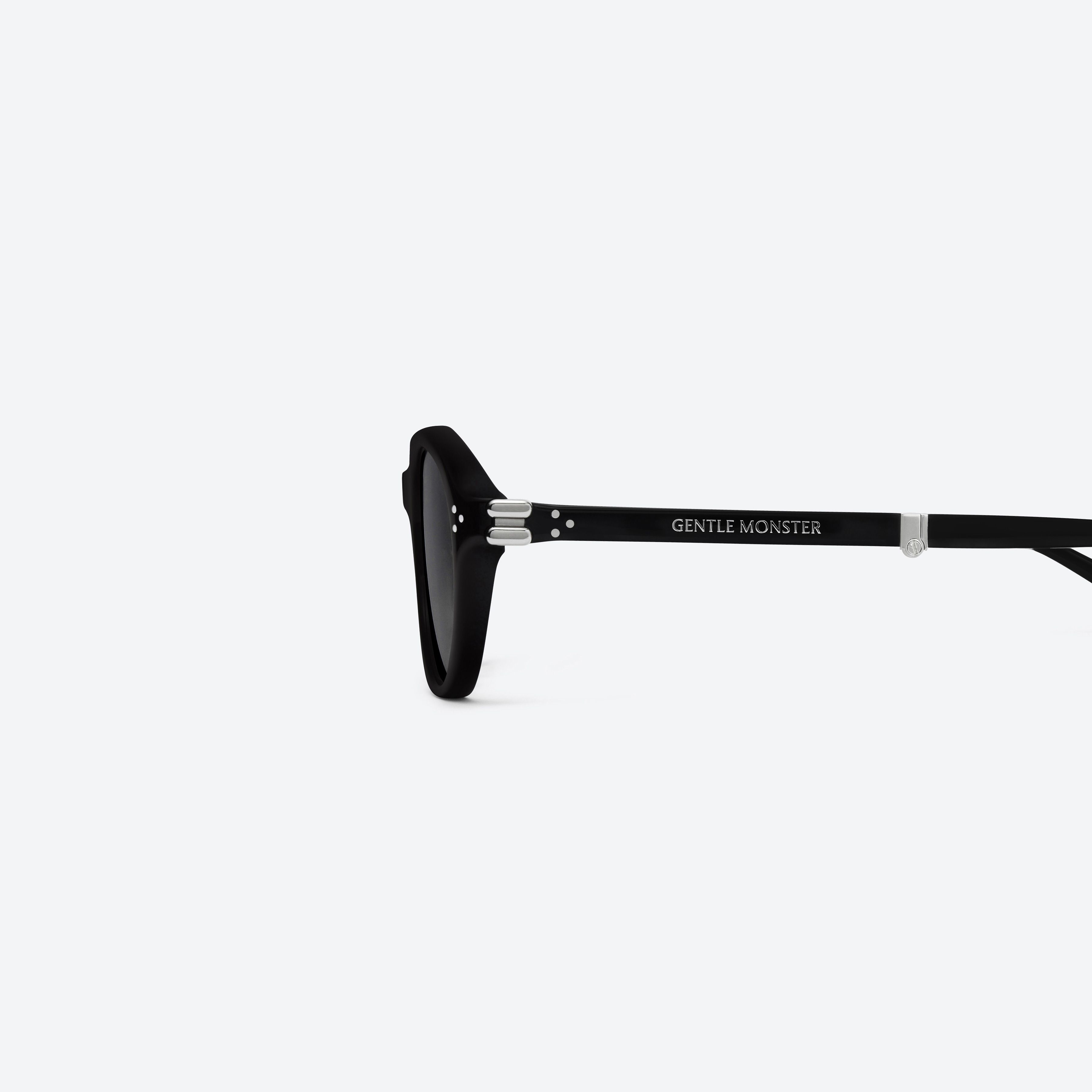 A detailed left view of Gentle Monster Harv 01 Black Acetate framed Aviator sunglasses.