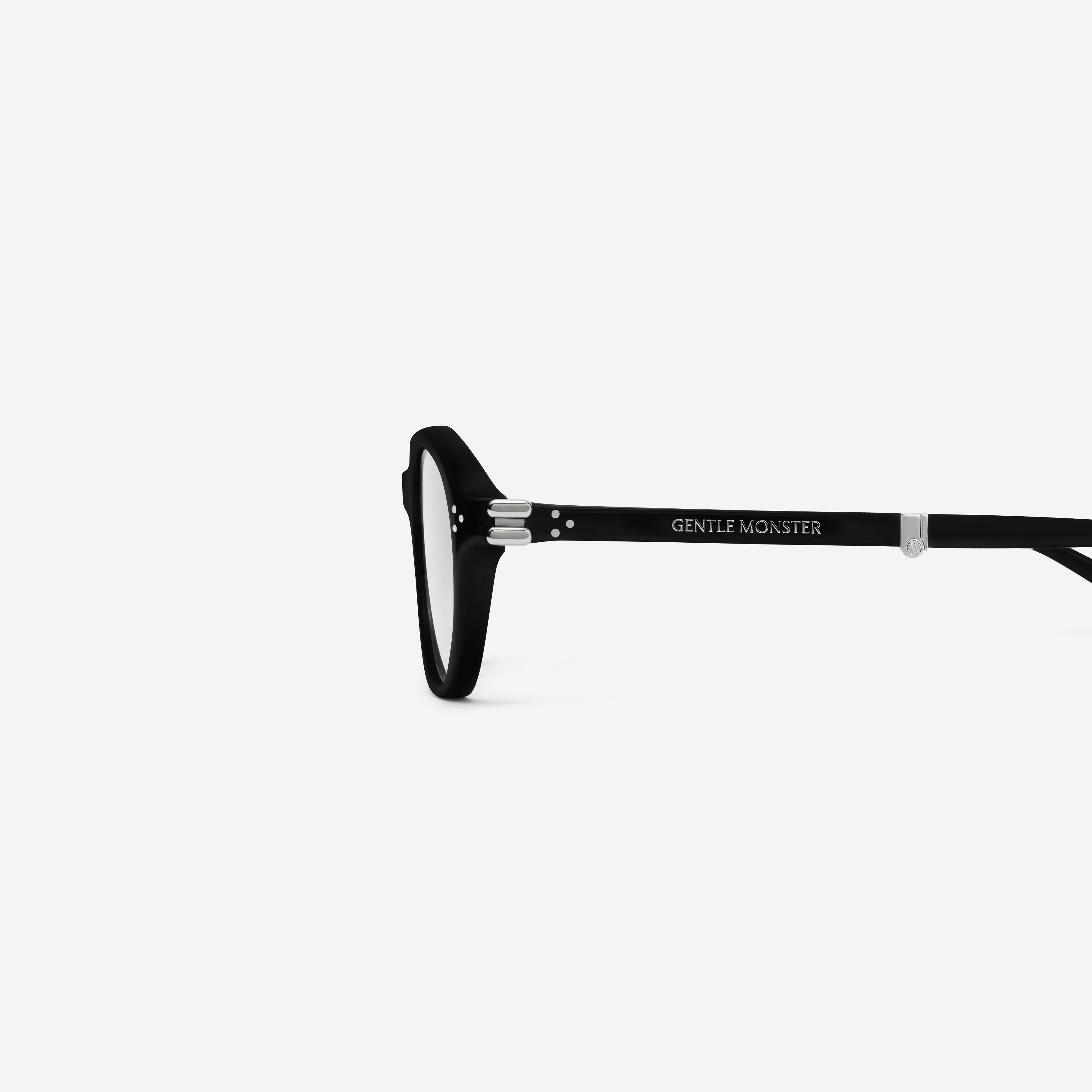 A detailed left view of Gentle Monster Harv 01(C) Black Acetate framed Aviator glasses.