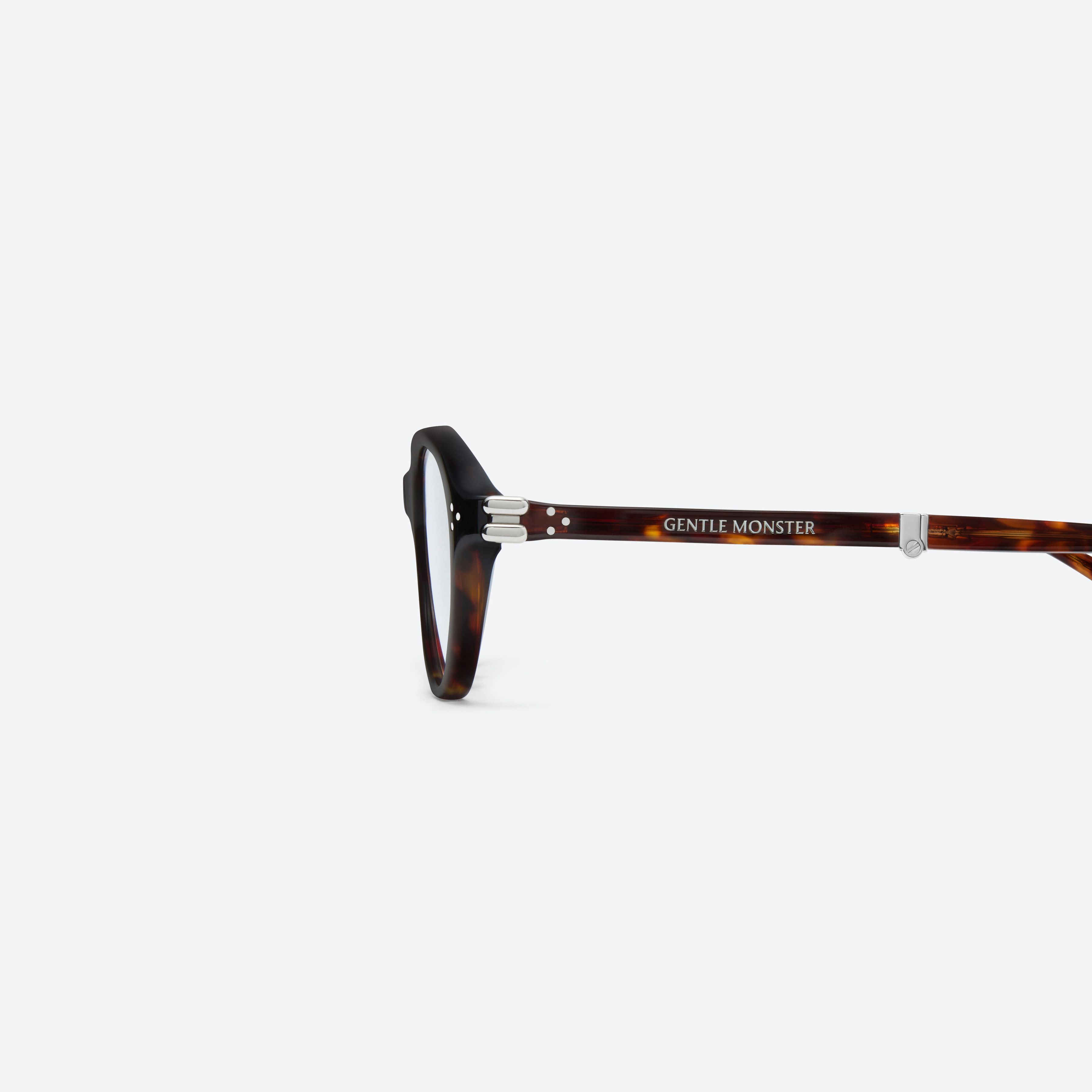 A detailed left view of Gentle Monster Harv T1(C) Tortoise Acetate framed Aviator glasses.
