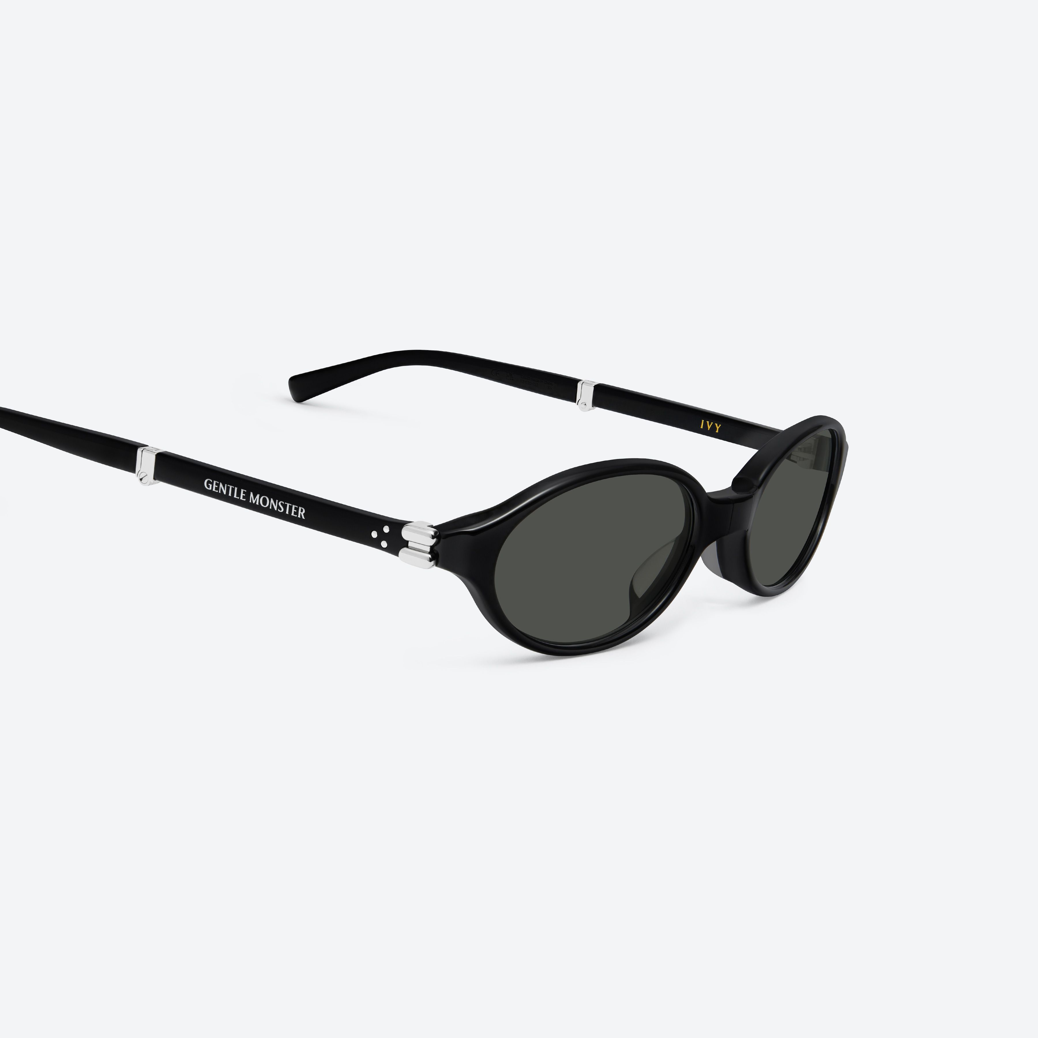 45-degree detailed view of Gentle Monster Ivy 01 Black Acetate framed Oval sunglasses.