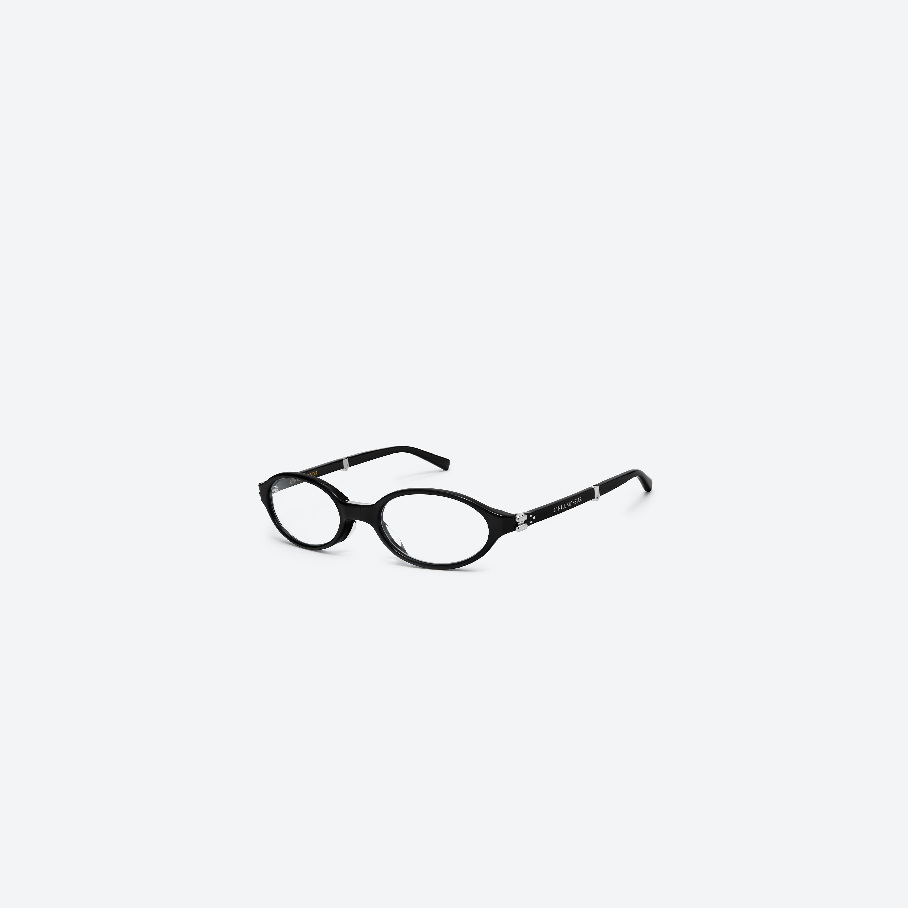 45-degree view of Gentle Monster Ivy 01(C) Black Acetate framed Oval glasses.