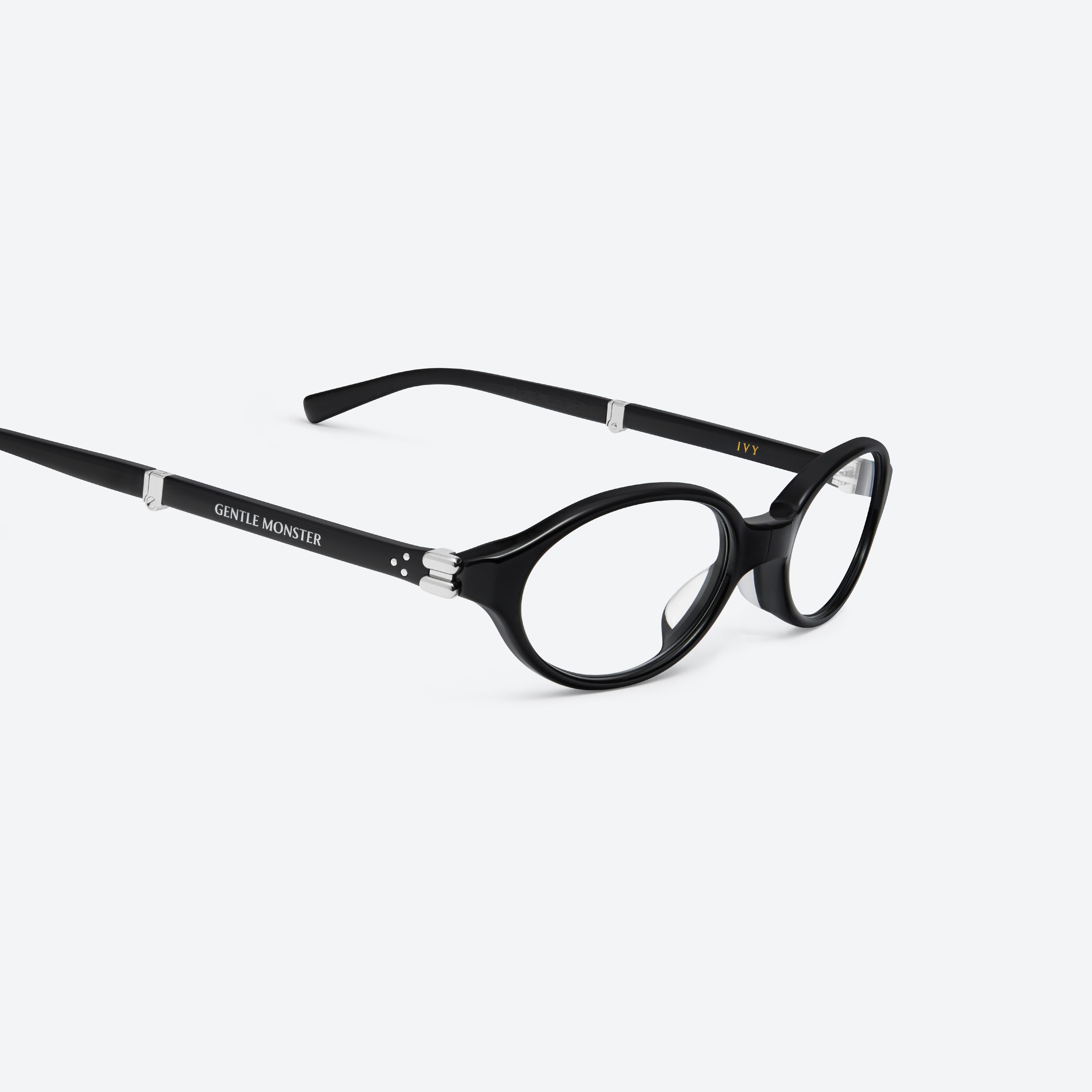 45-degree detailed view of Gentle Monster Ivy 01(C) Black Acetate framed Oval glasses.