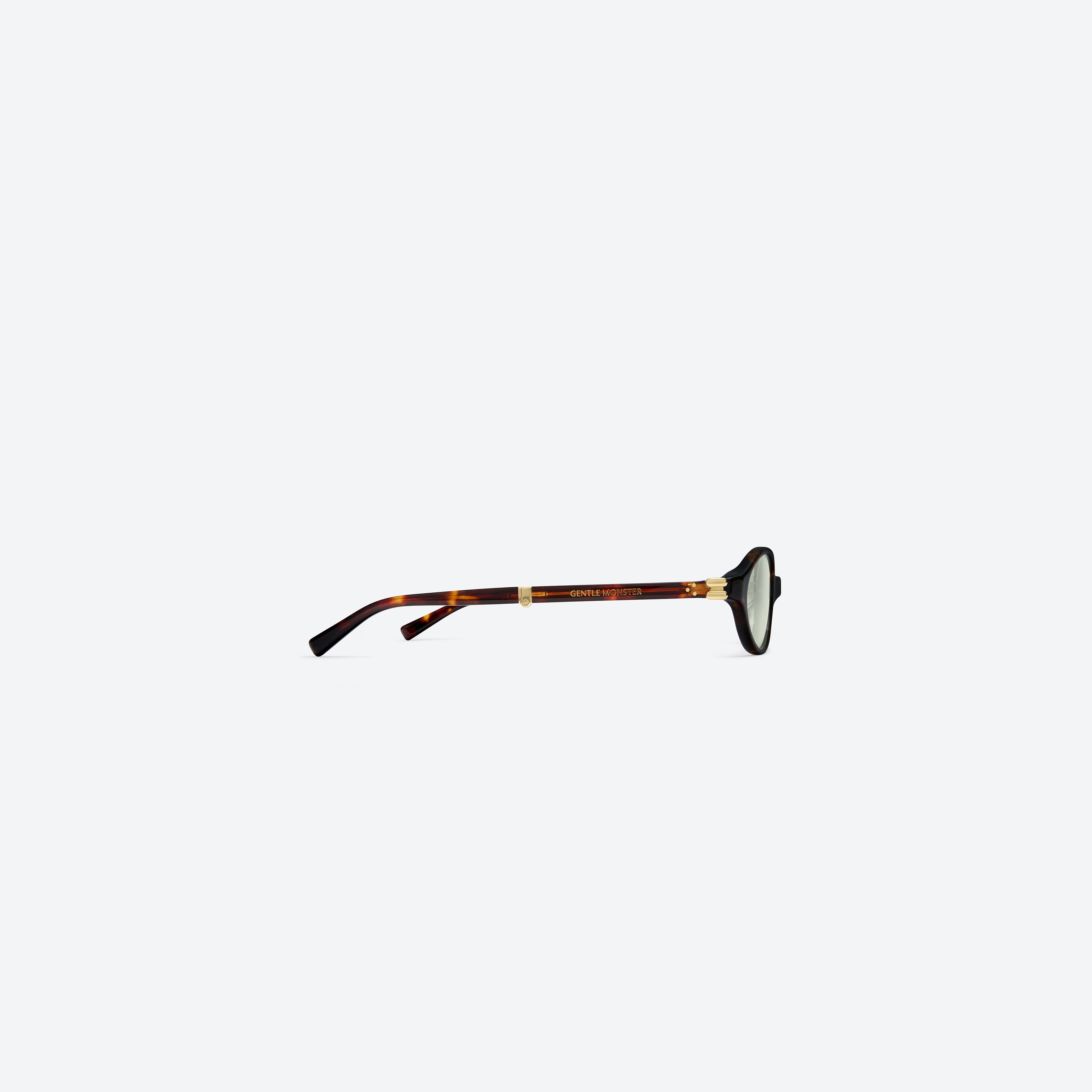 A detailed right view of Gentle Monster Ivy T1 Tortoise Acetate framed Oval sunglasses.