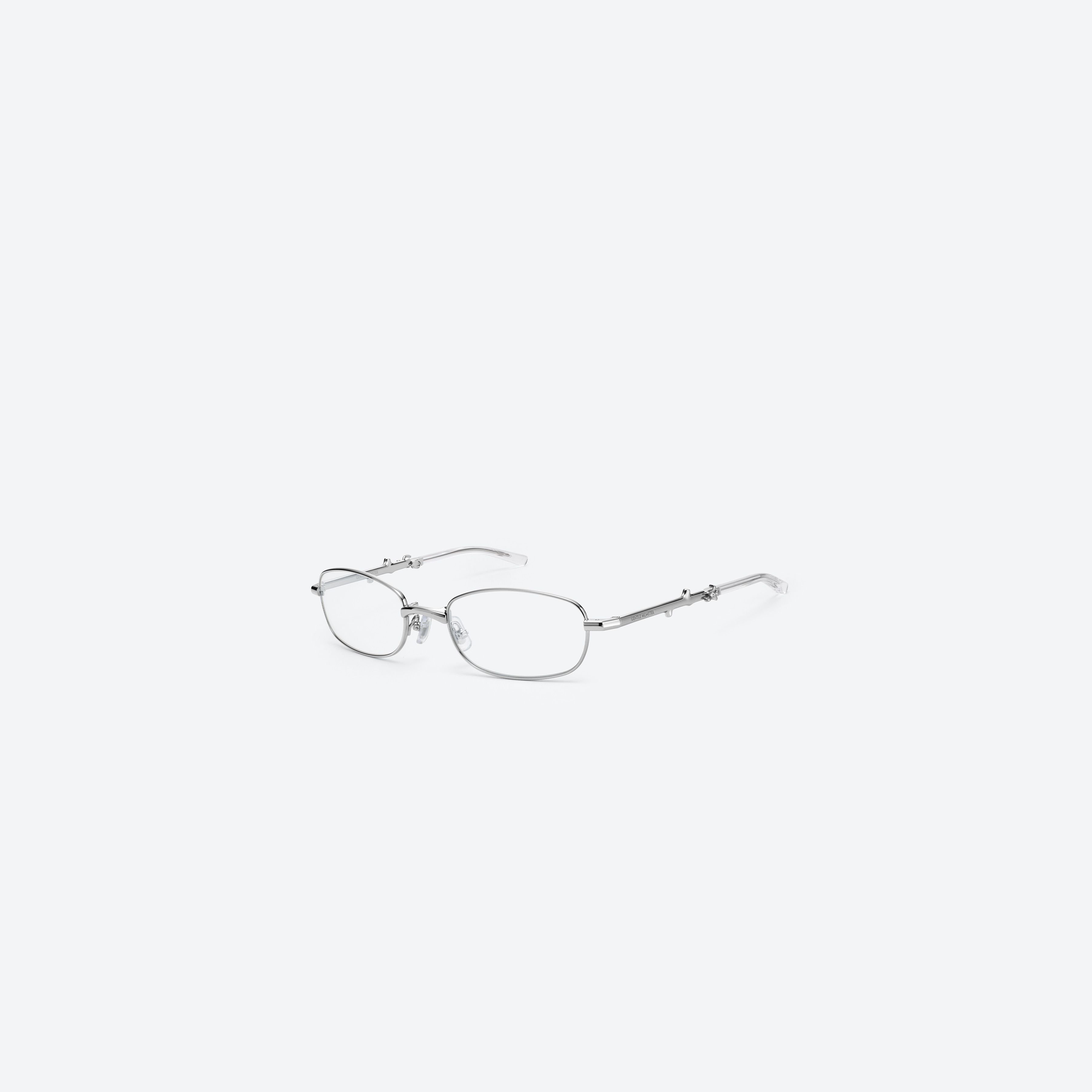 45-degree view of Gentle Monster Mori 02 Silver Metal framed Square glasses.