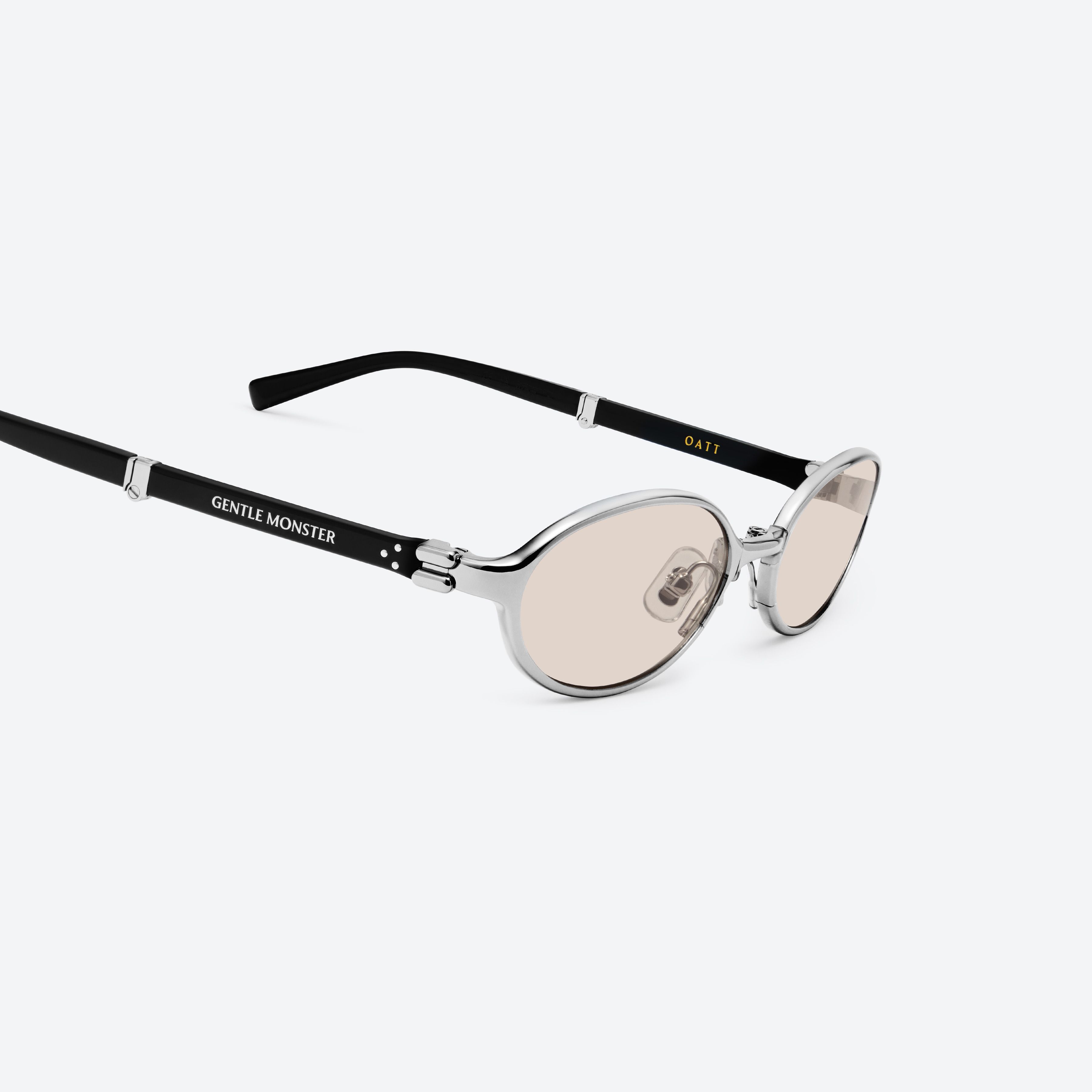 45-degree detailed view of Gentle Monster Oatt 02 Silver Mixed framed Oval sunglasses.