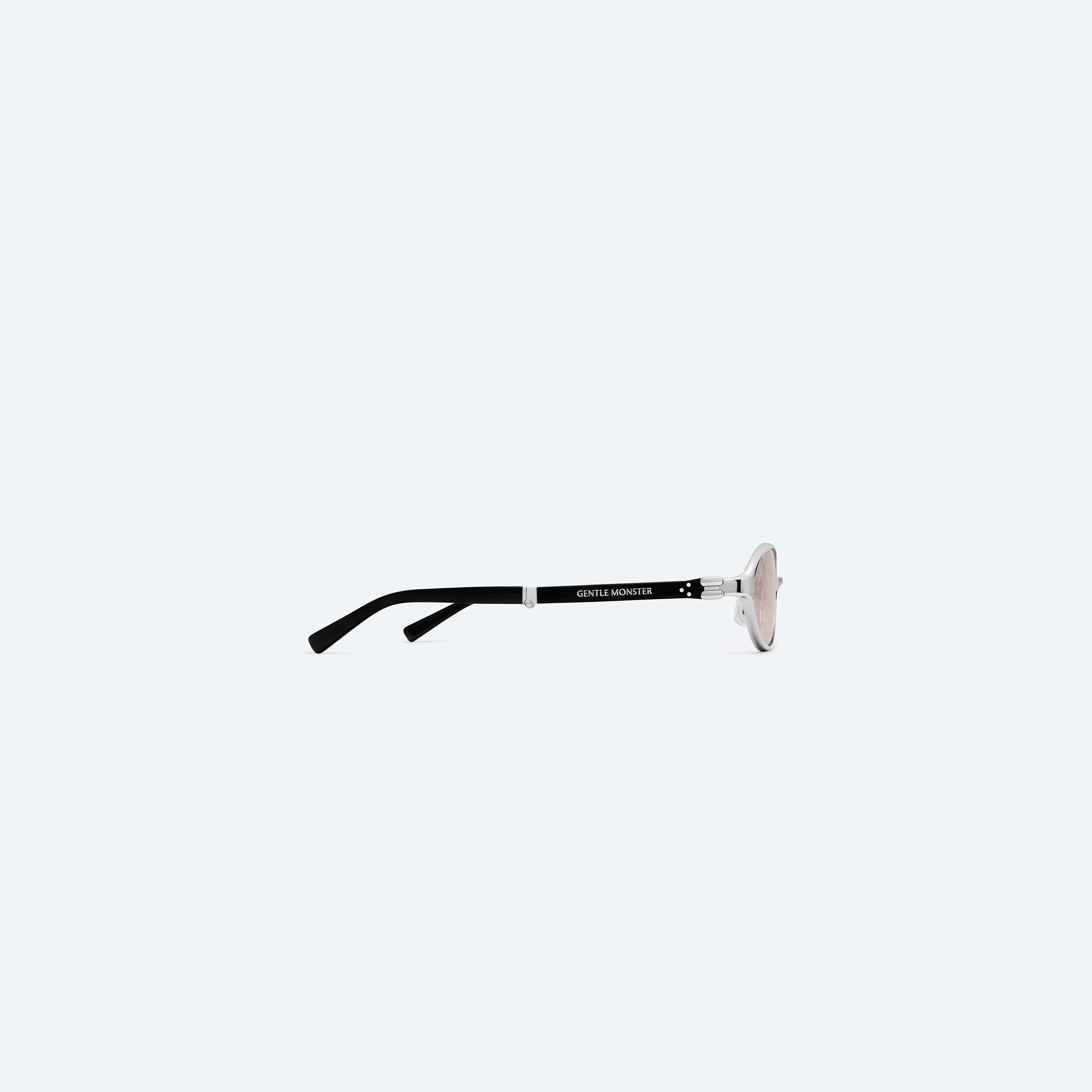 A detailed right view of Gentle Monster Oatt 02 Silver Mixed framed Oval sunglasses.