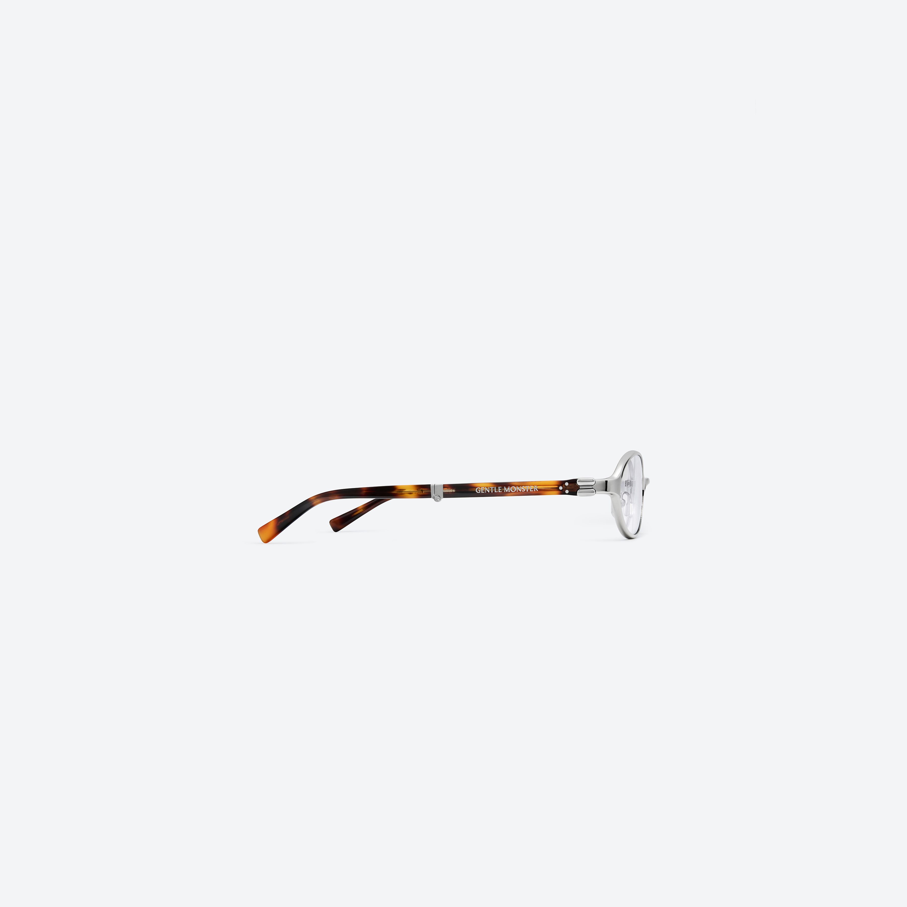 A detailed right view of Gentle Monster Oatt 02(C) Silver Mixed framed Oval glasses.