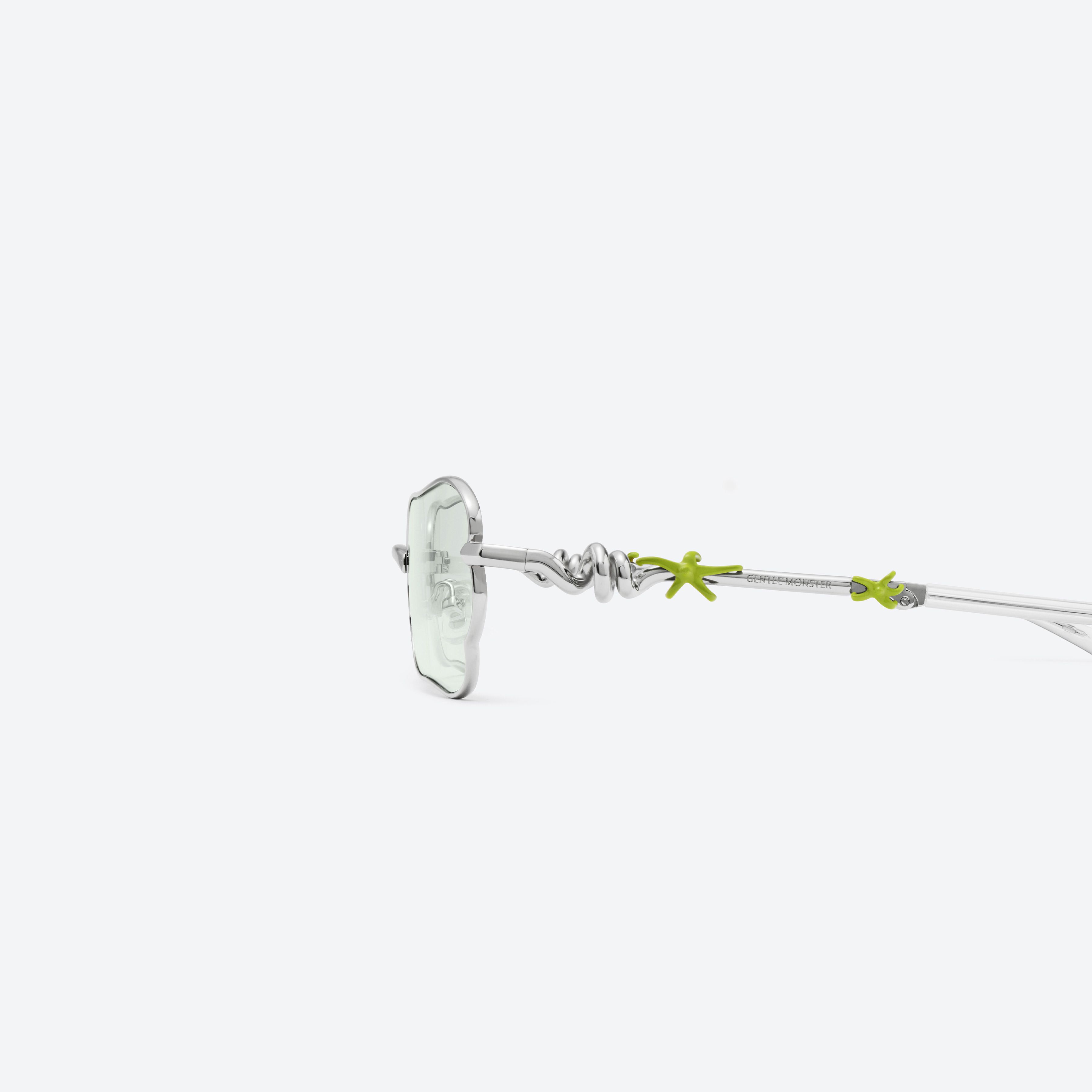 A detailed left view of Gentle Monster Tofi 02 Silver Metal framed Square sunglasses.