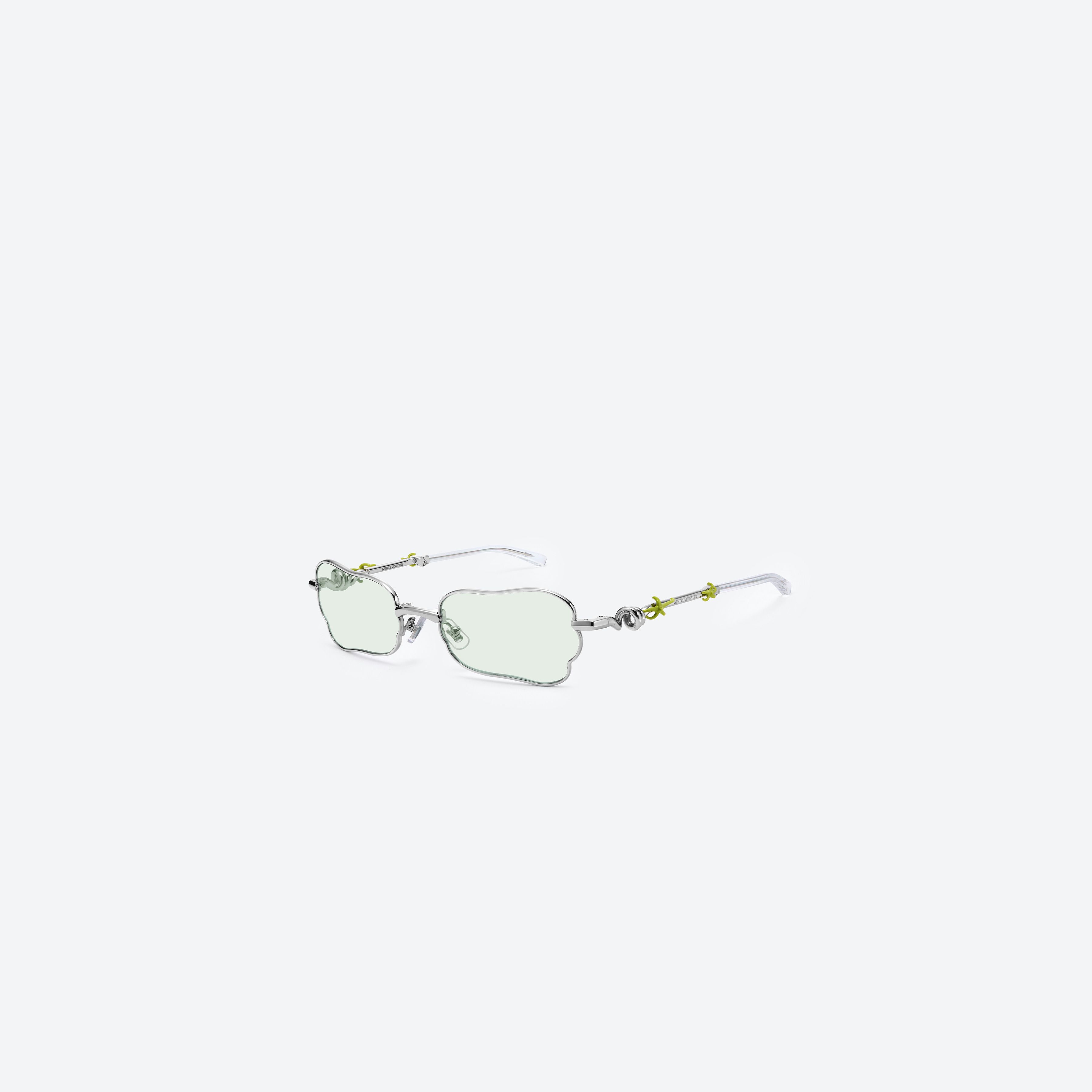 45-degree view of Gentle Monster Tofi 02 Silver Metal framed Square sunglasses.