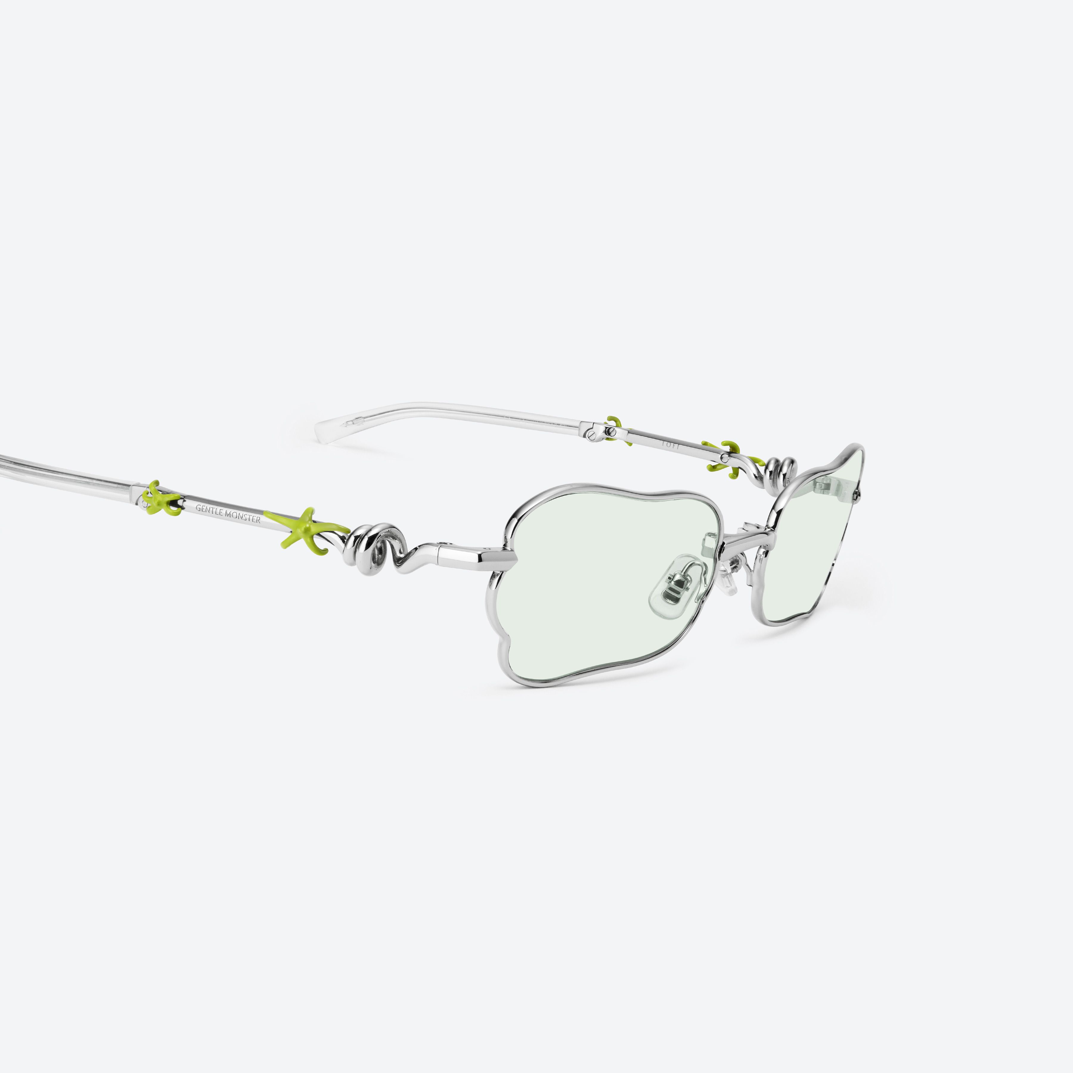 45-degree detailed view of Gentle Monster Tofi 02 Silver Metal framed Square sunglasses.