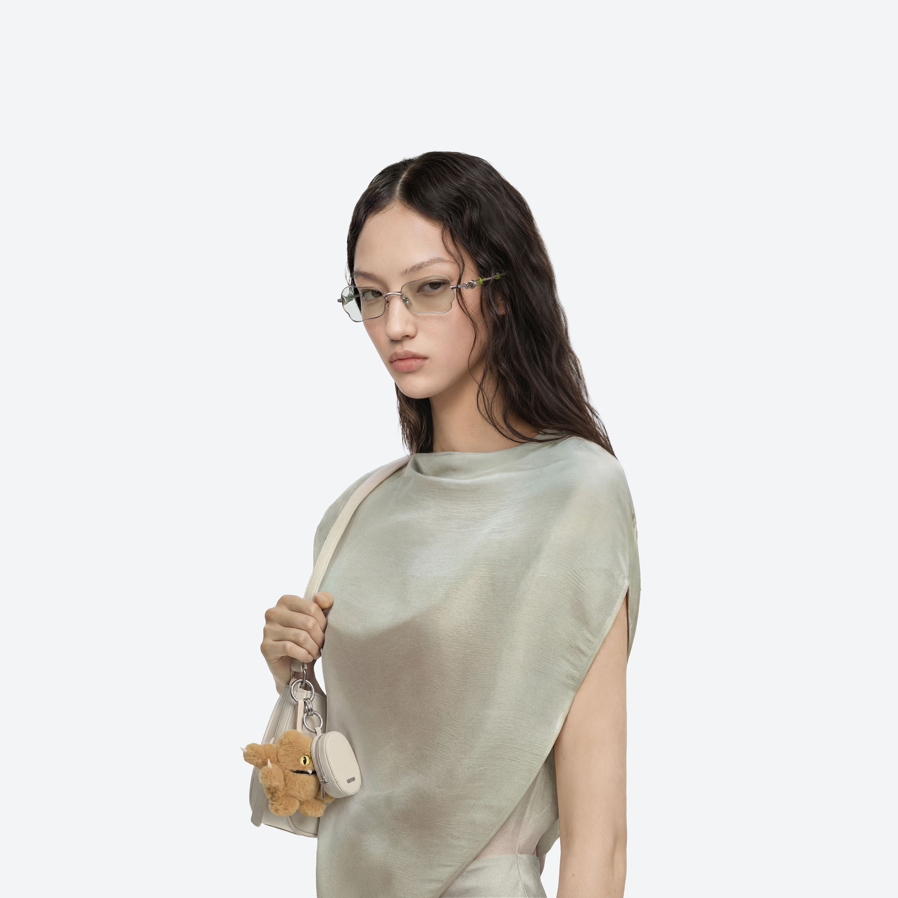 Model wearing the Tofi 02 Silver Metal framed Square sunglasses.