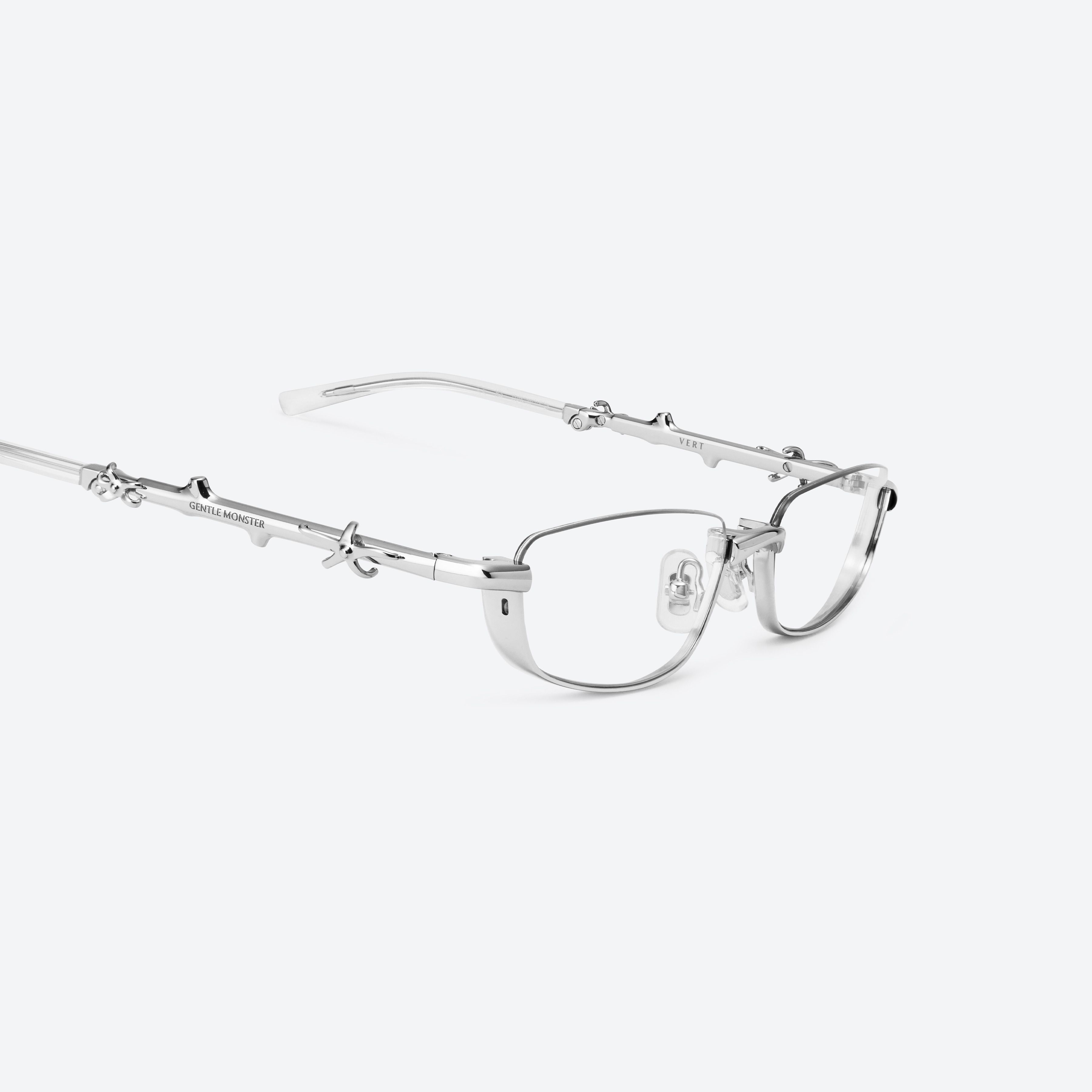 45-degree detailed view of Gentle Monster Vert 02 Silver Metal framed Square glasses.