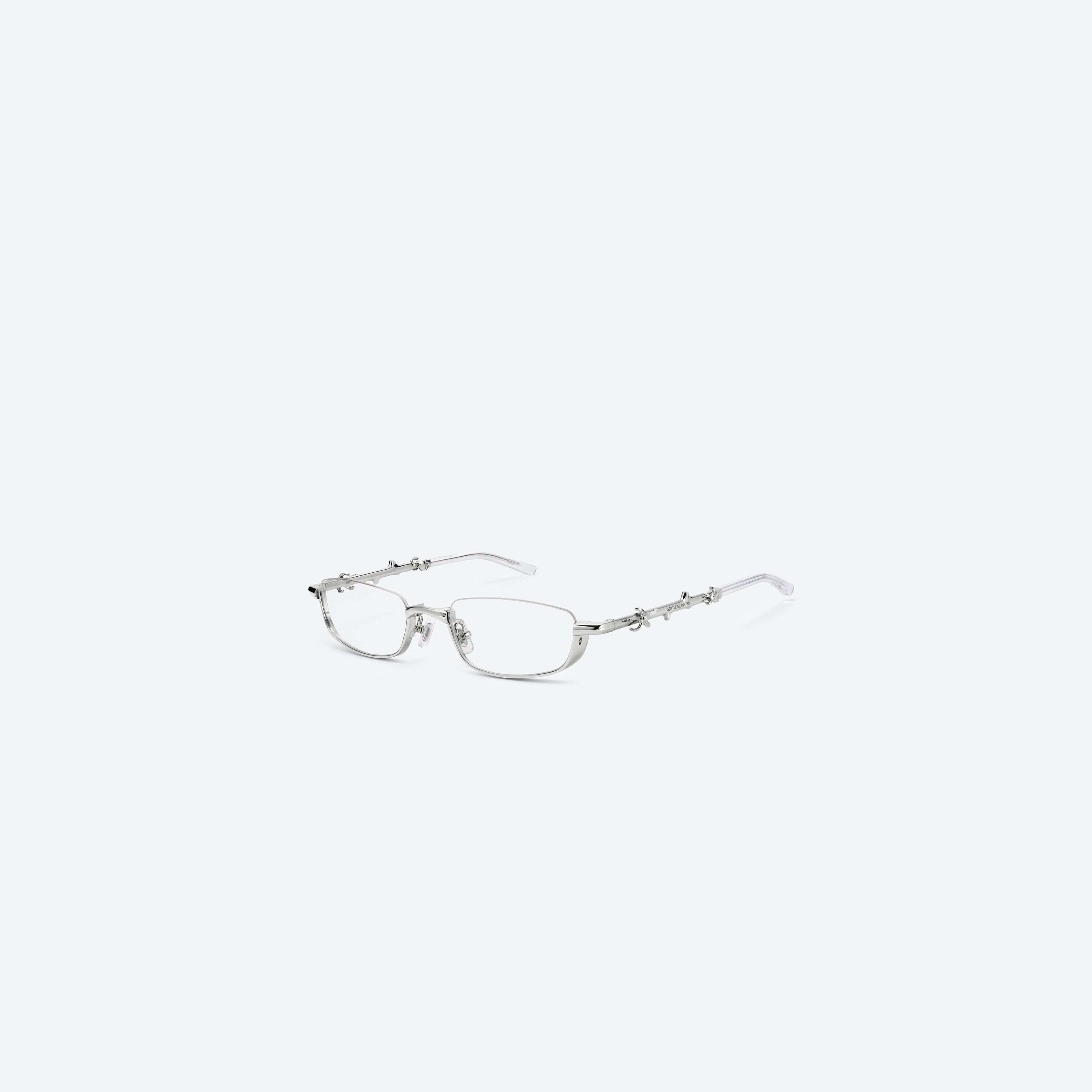 45-degree view of Gentle Monster Vert 02 Silver Metal framed Square glasses.
