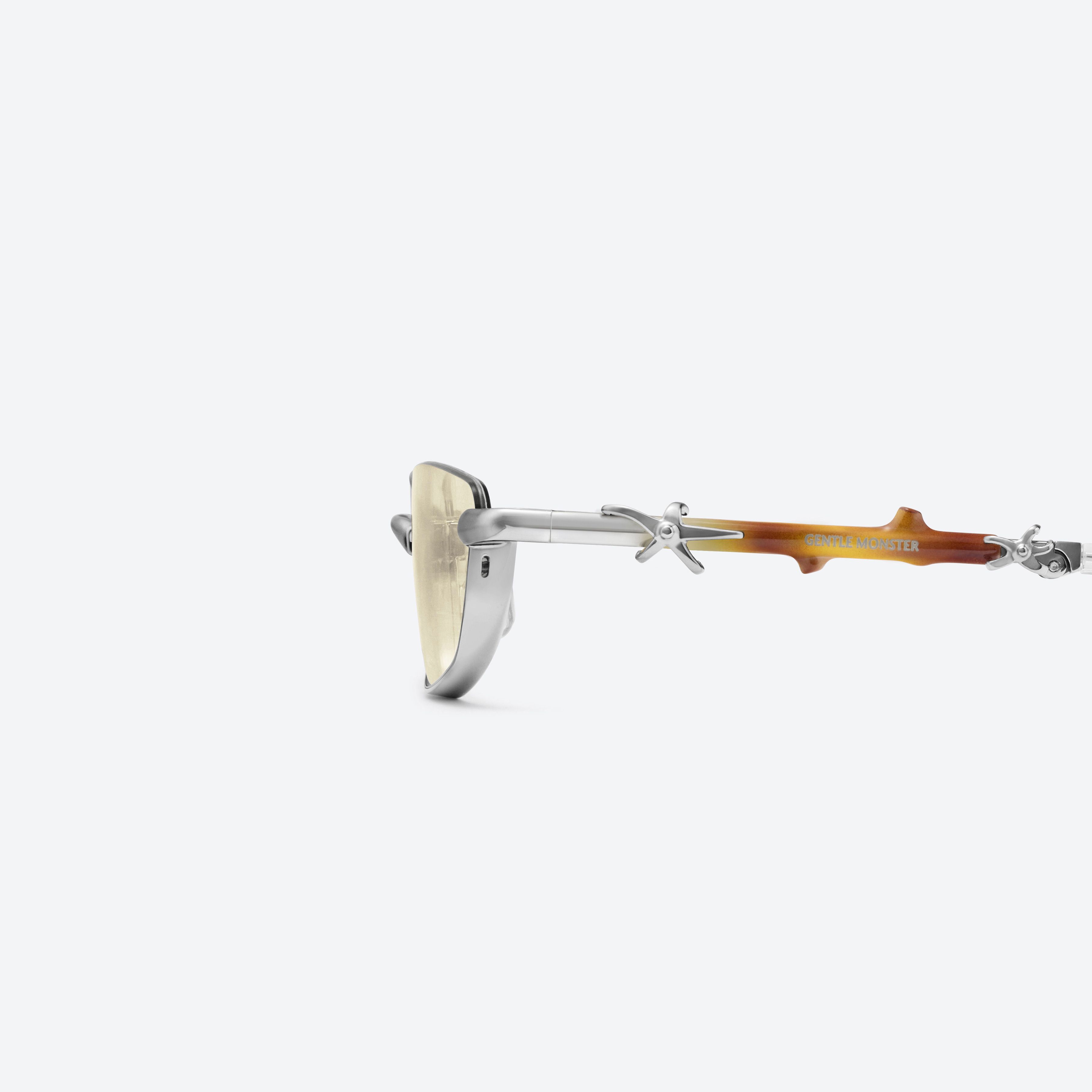 A detailed left view of Gentle Monster Vert 02(CM) Similar Silver Metal framed Square sunglasses.