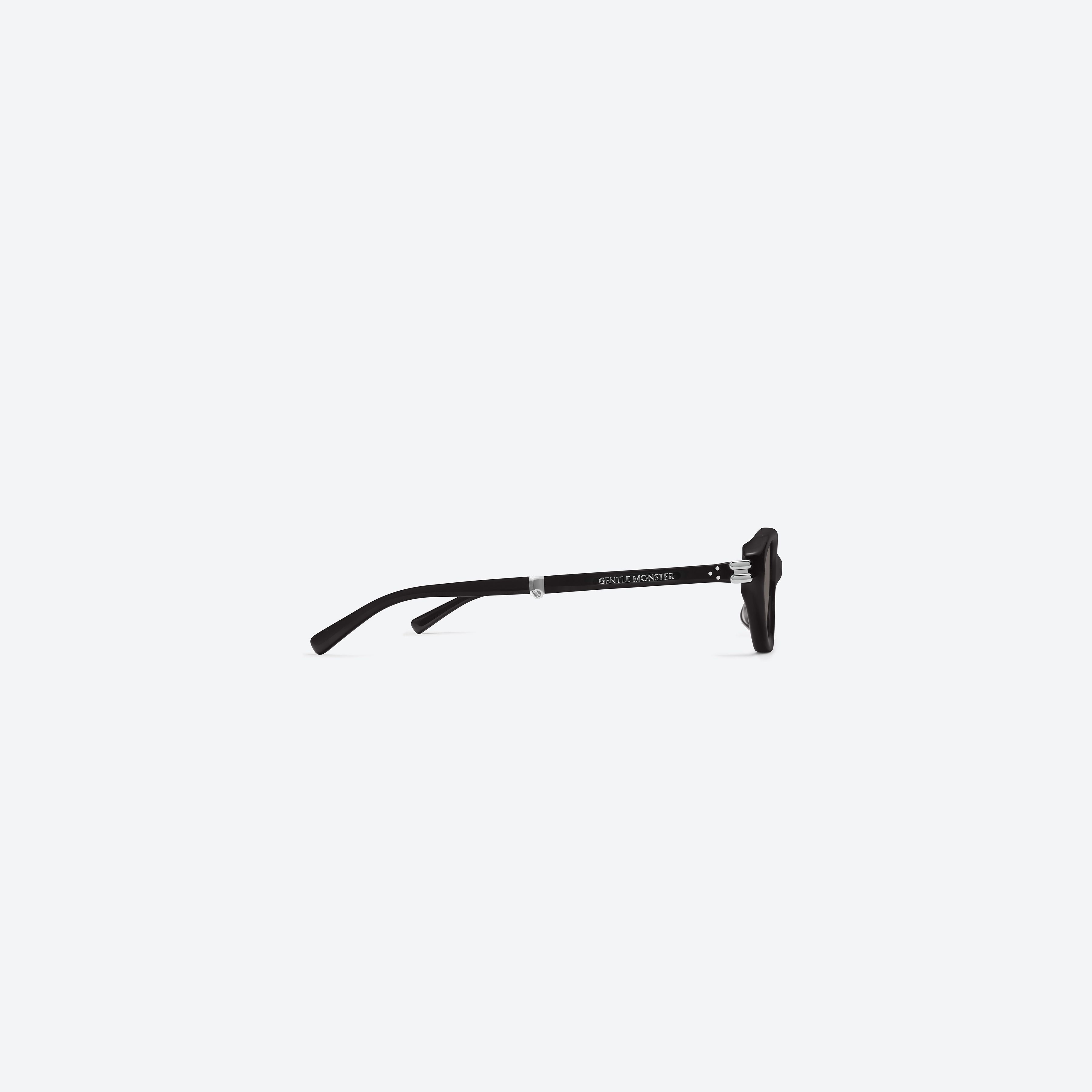 A detailed right view of Gentle Monster Zest BR2 Brown Acetate framed Oval sunglasses.