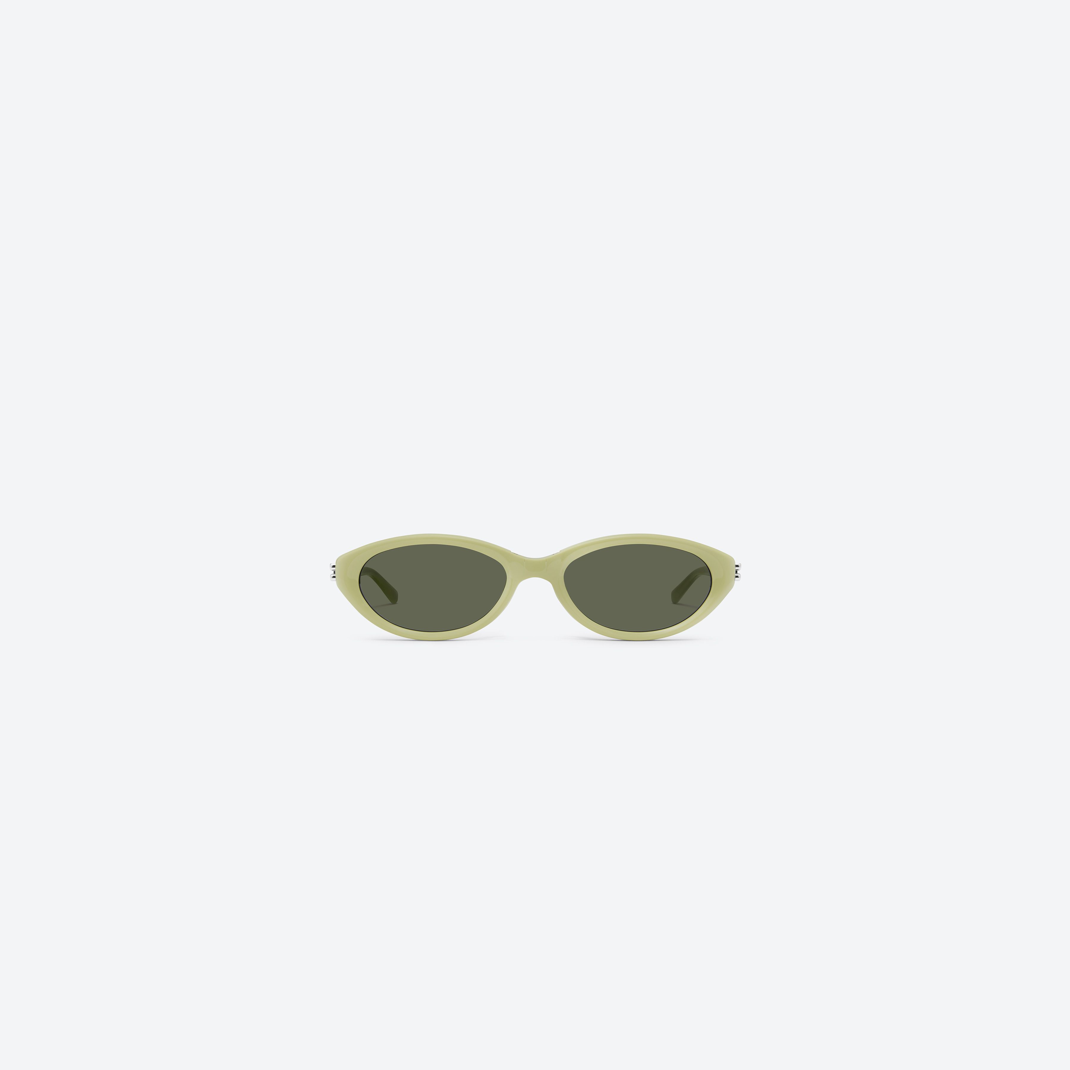A front view of Gentle Monster Zest GR9 Green Acetate framed Oval sunglasses.
