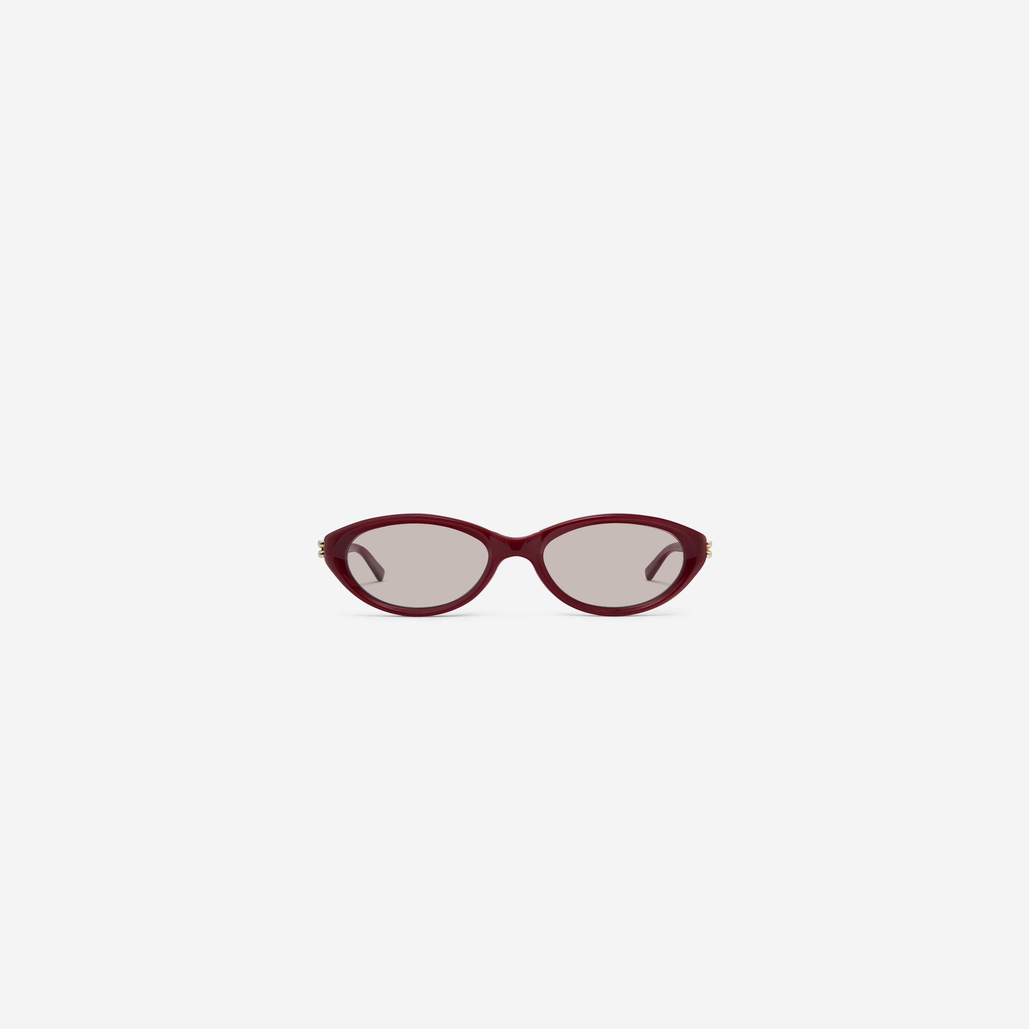 A front view of Gentle Monster Zest R8 Red Acetate framed Oval sunglasses.