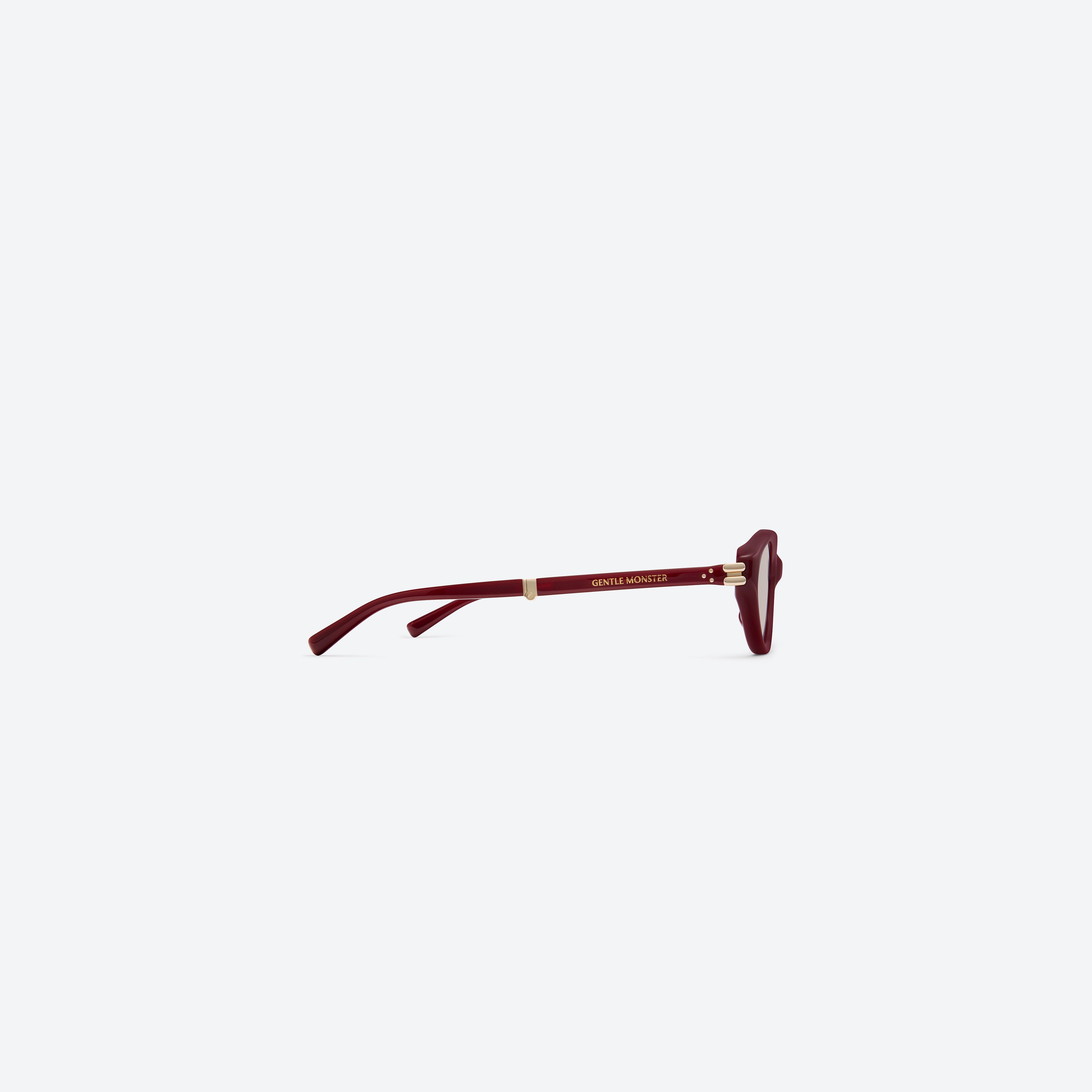 A detailed right view of Gentle Monster Zest R8 Red Acetate framed Oval sunglasses.