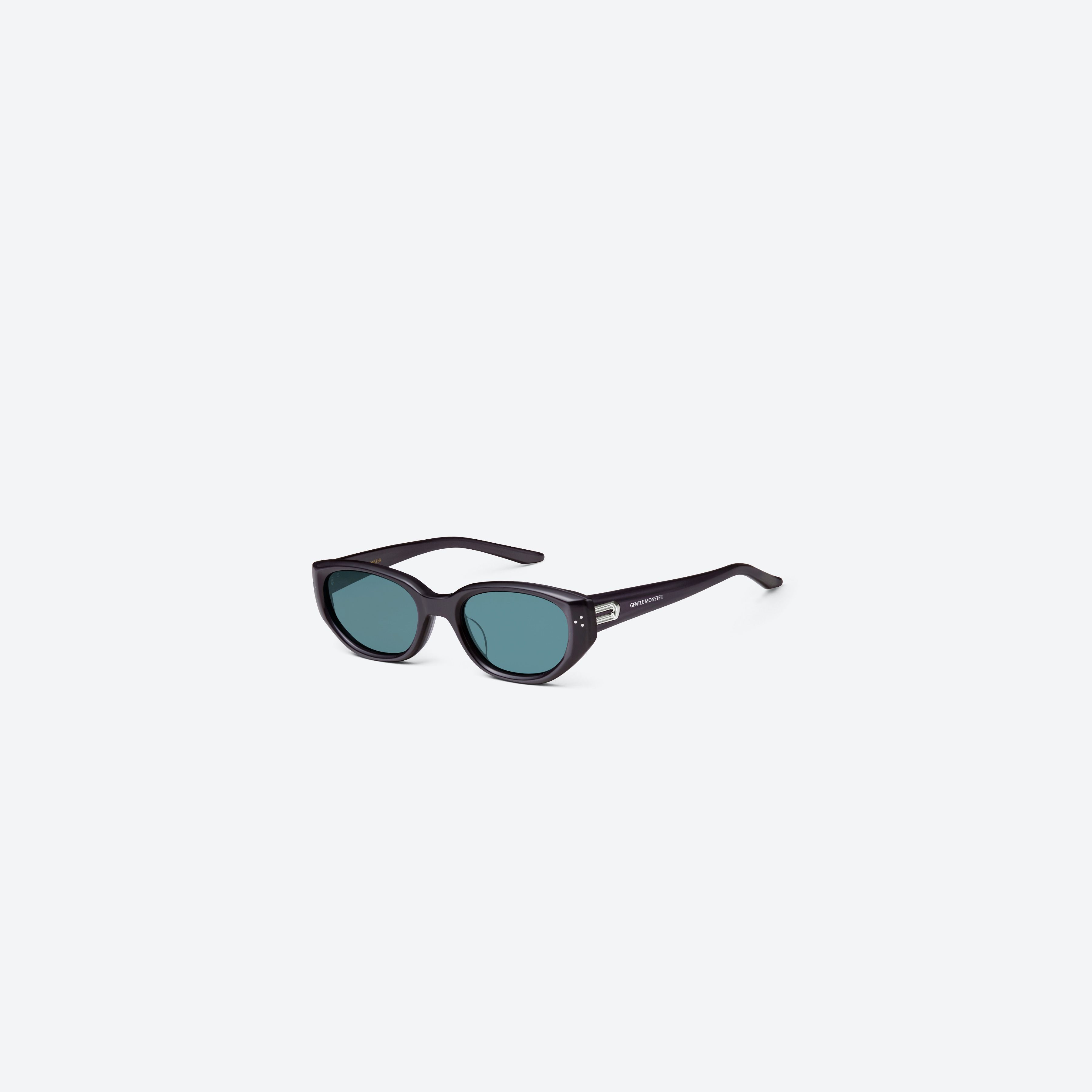 45-degree view of Gentle Monster Boni G11(BL) Similar Gray Acetate framed Cat-eye sunglasses.