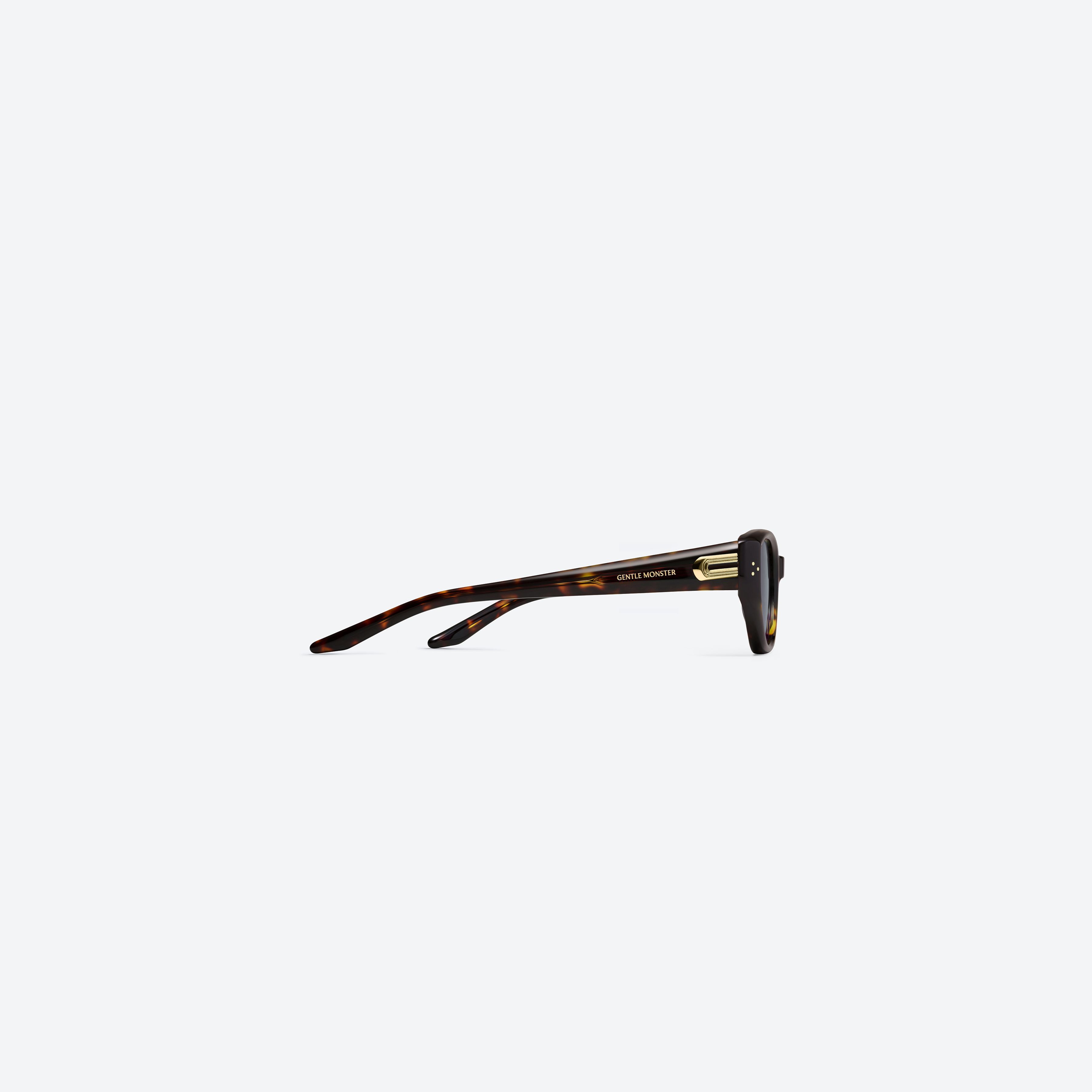 A detailed right view of Gentle Monster Boni T9(G) Tortoise Acetate framed Cat-eye sunglasses.