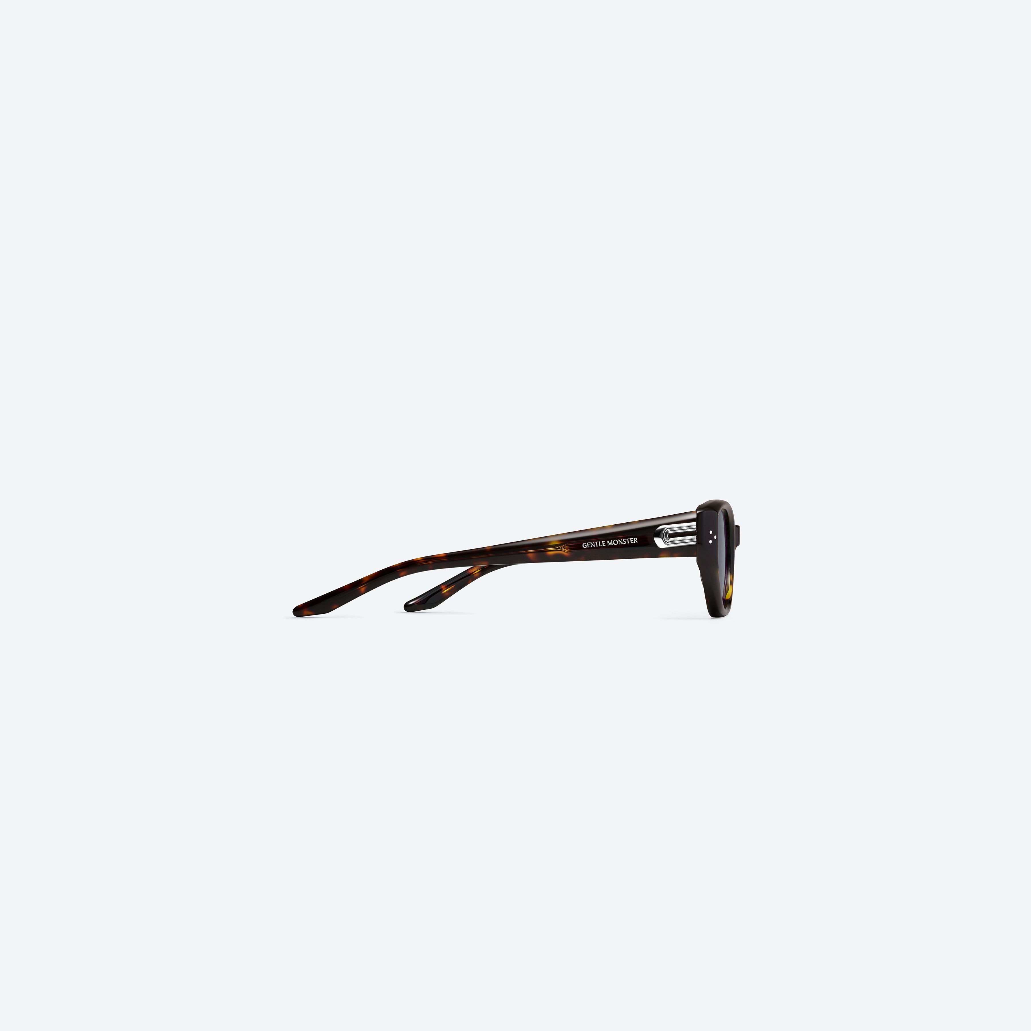 A detailed right view of Gentle Monster Boni T9(G) Tortoise Acetate framed Cat-eye sunglasses.