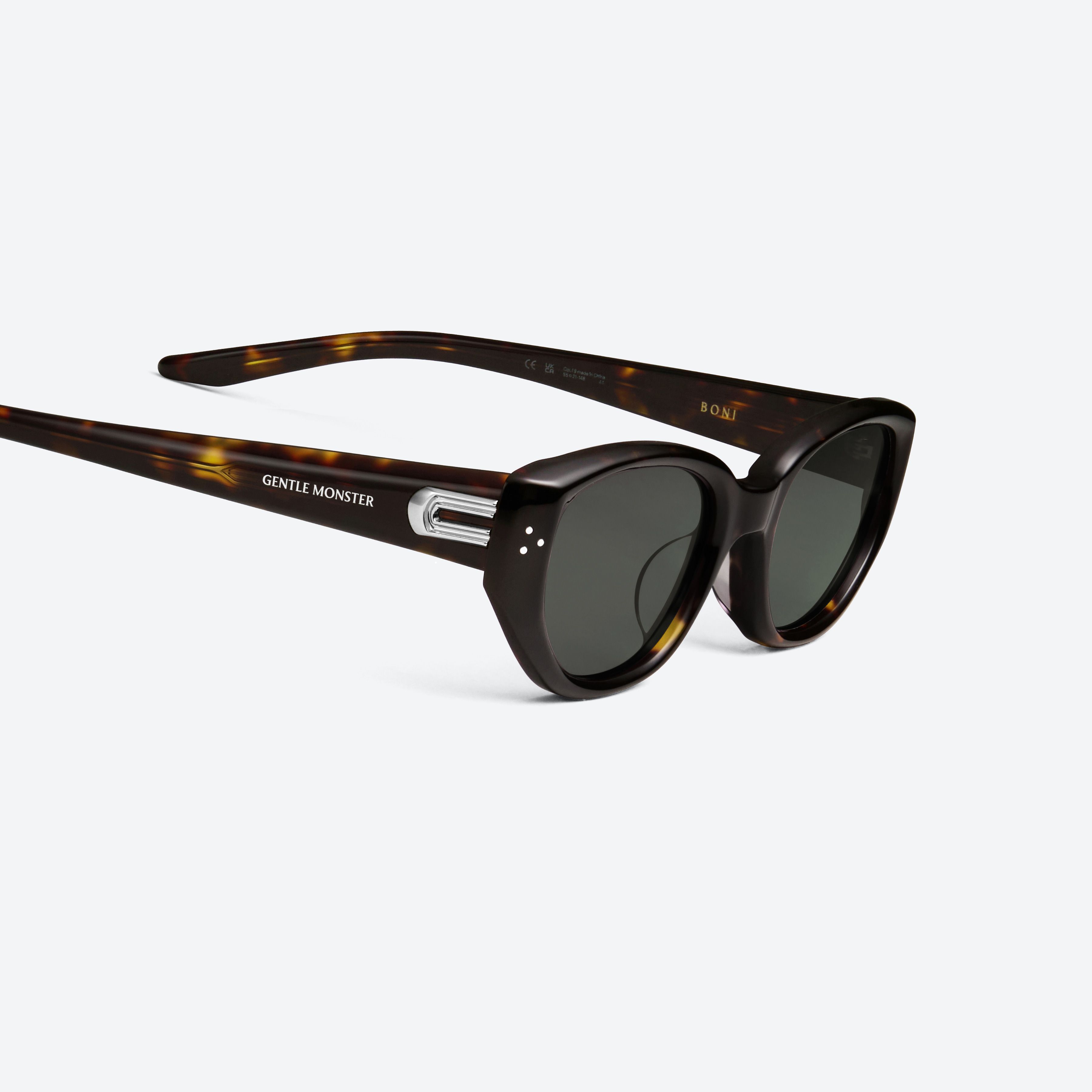 45-degree detailed view of Gentle Monster Boni T9(G) Tortoise Acetate framed Cat-eye sunglasses.