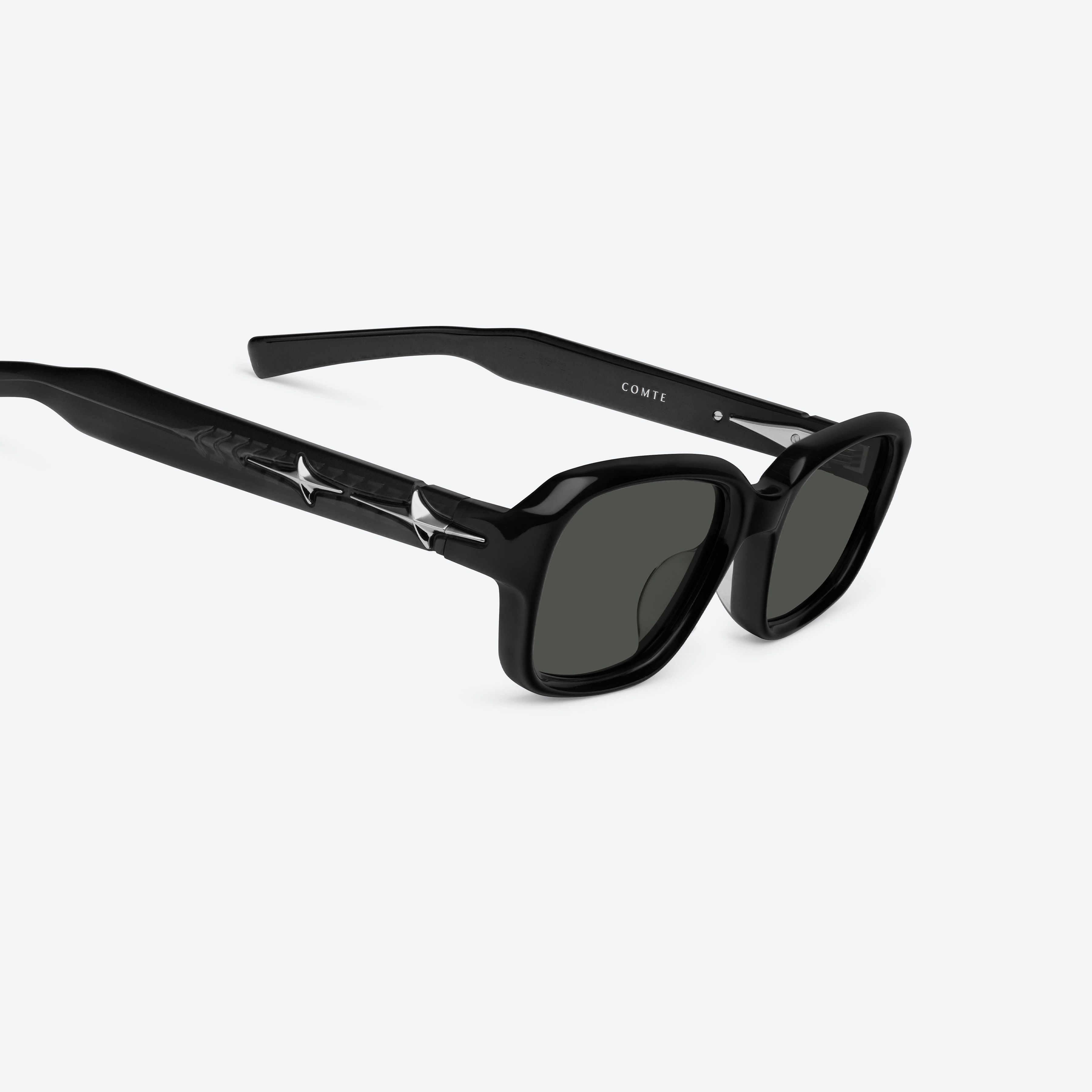 45-degree detailed view of Gentle Monster Comte 01(G) Black Acetate framed Square glasses.