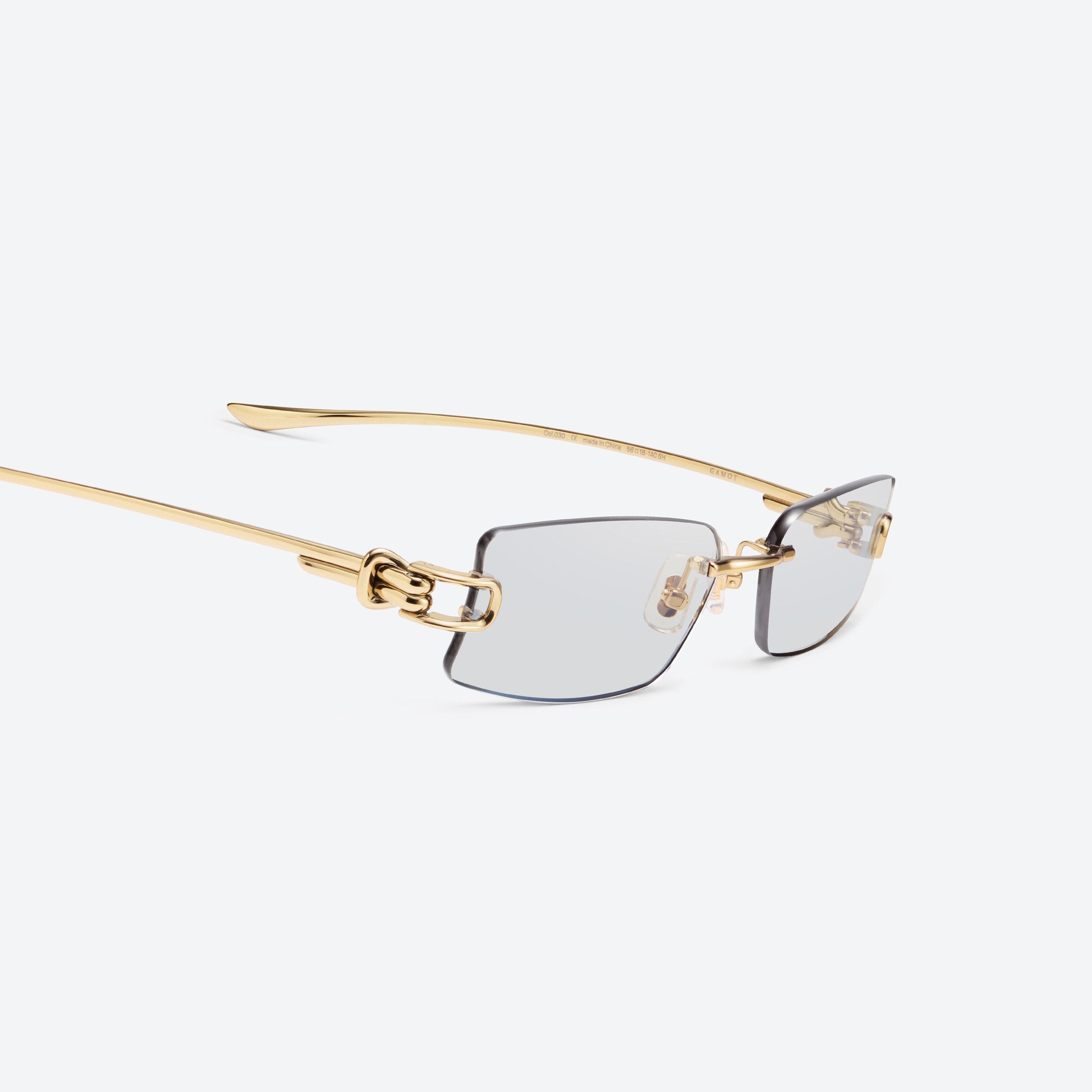 45-degree detailed view of Gentle Monster Gamot 030 Gold Metal framed Square sunglasses.
