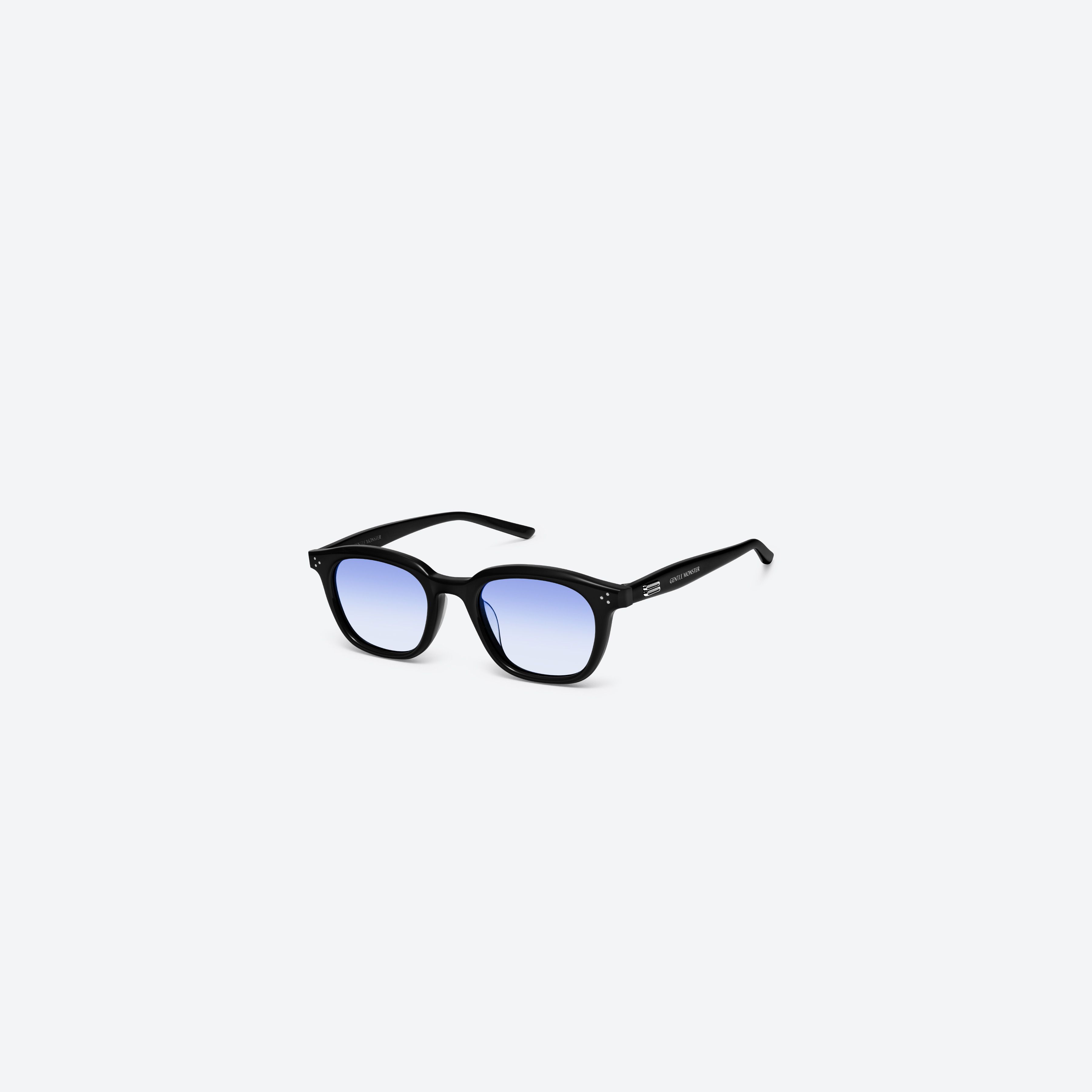 45-degree view of Gentle Monster Noho 01(BLG) Black Acetate framed Round sunglasses.