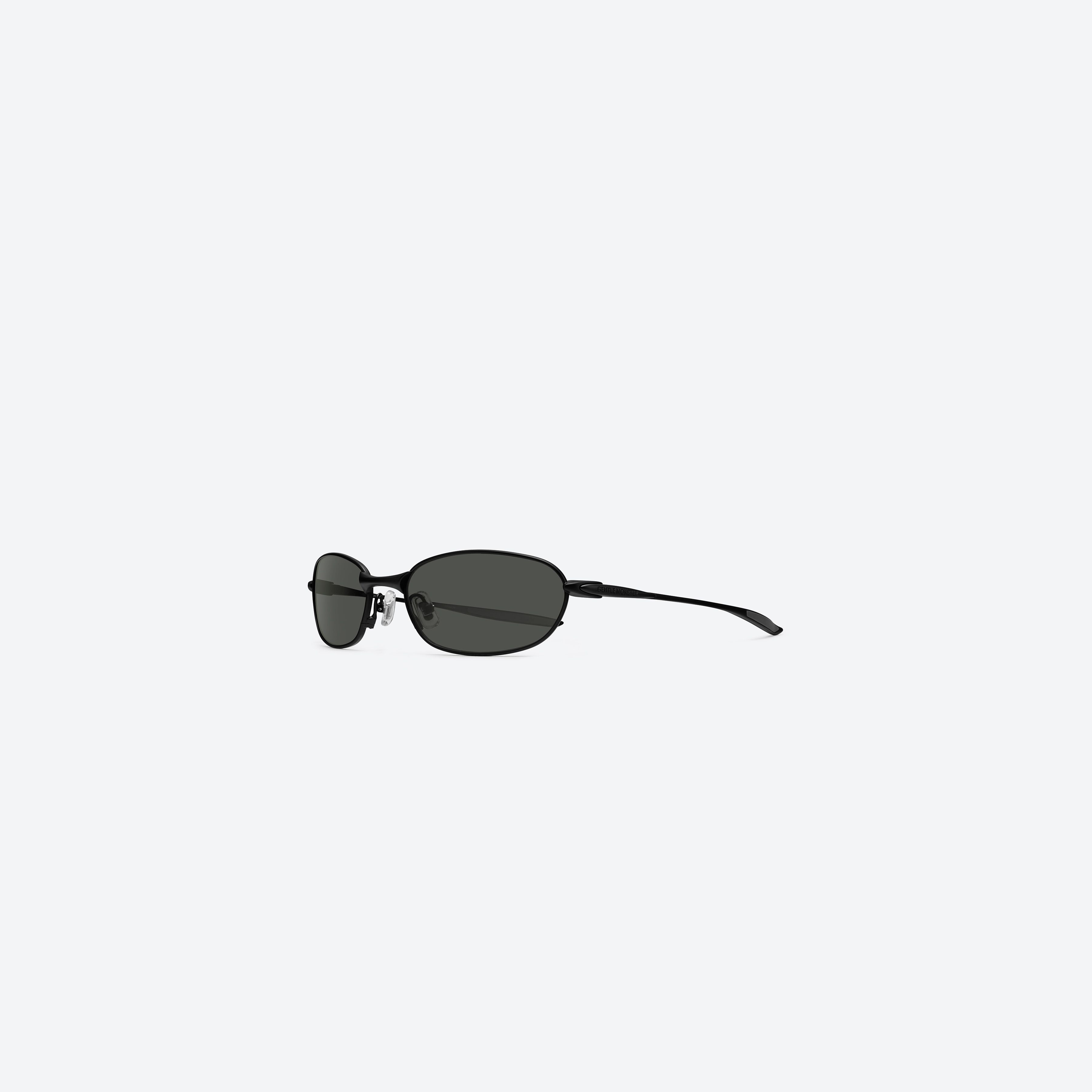 45-degree view of Gentle Monster Pitot M01 Black Metal framed Wraparound sunglasses.
