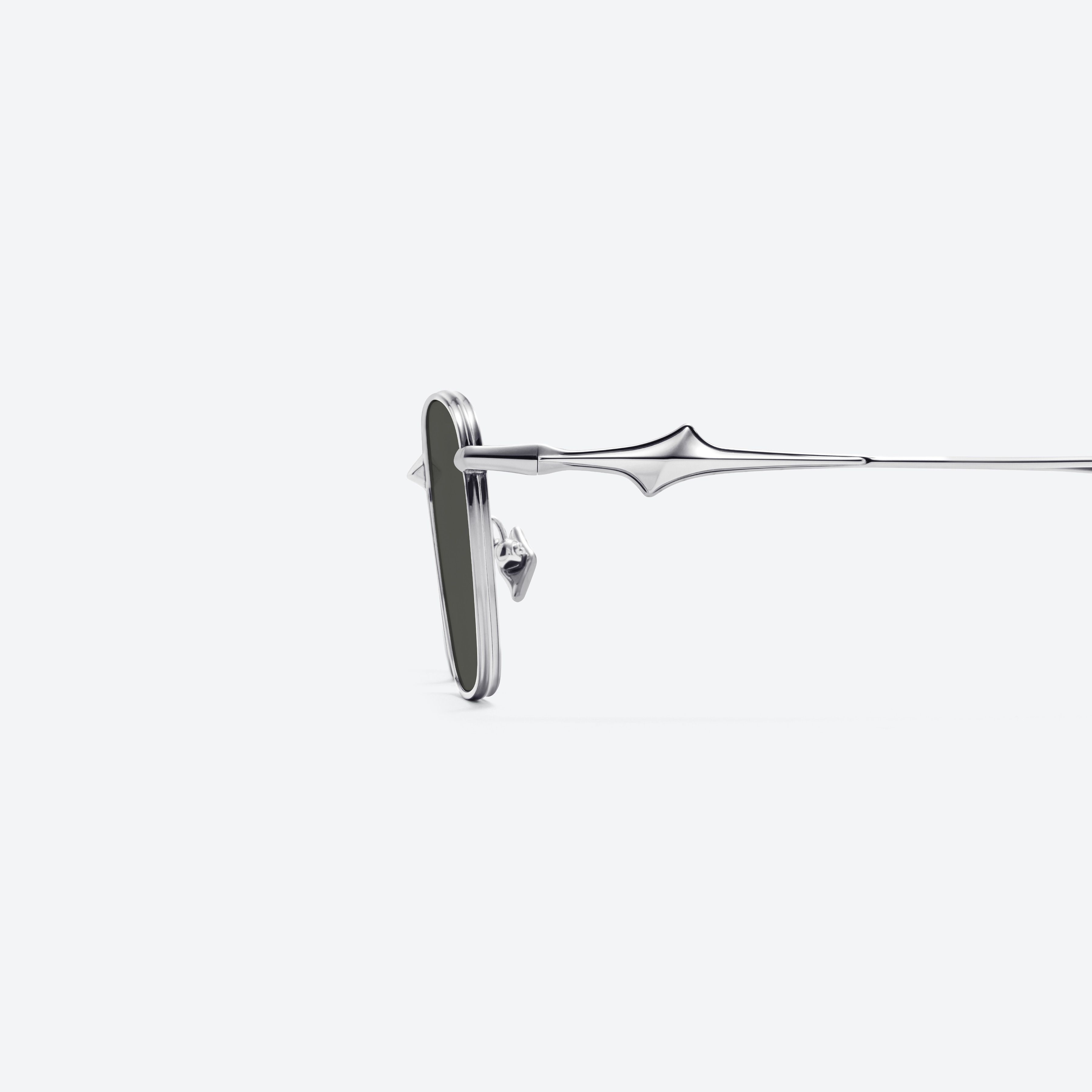 A detailed left view of Gentle Monster Vanta 02(G) Silver Metal framed Square sunglasses.