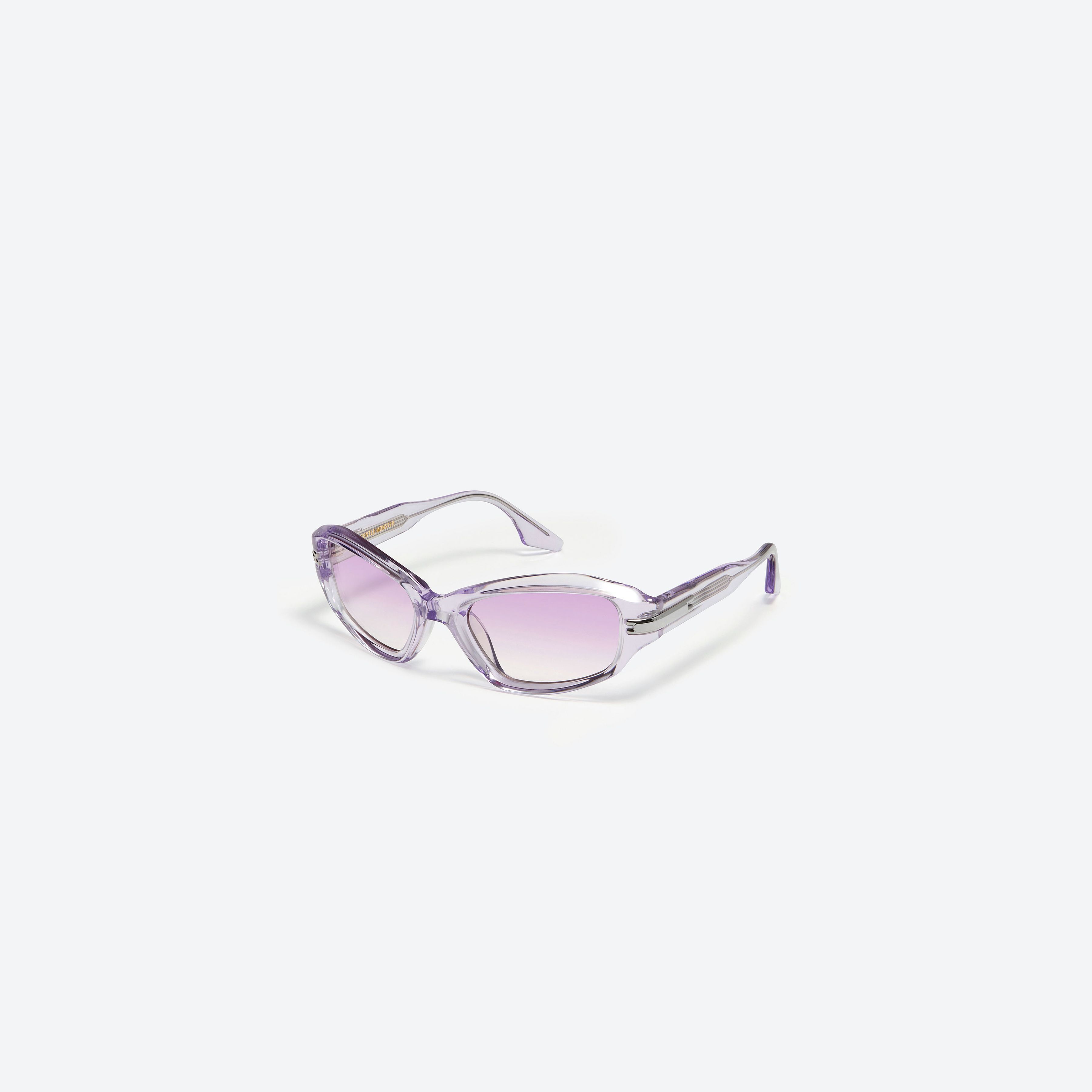 45-degree view of Gentle Monster Tidan VC5 Purple Acetate framed Wraparound sunglasses.