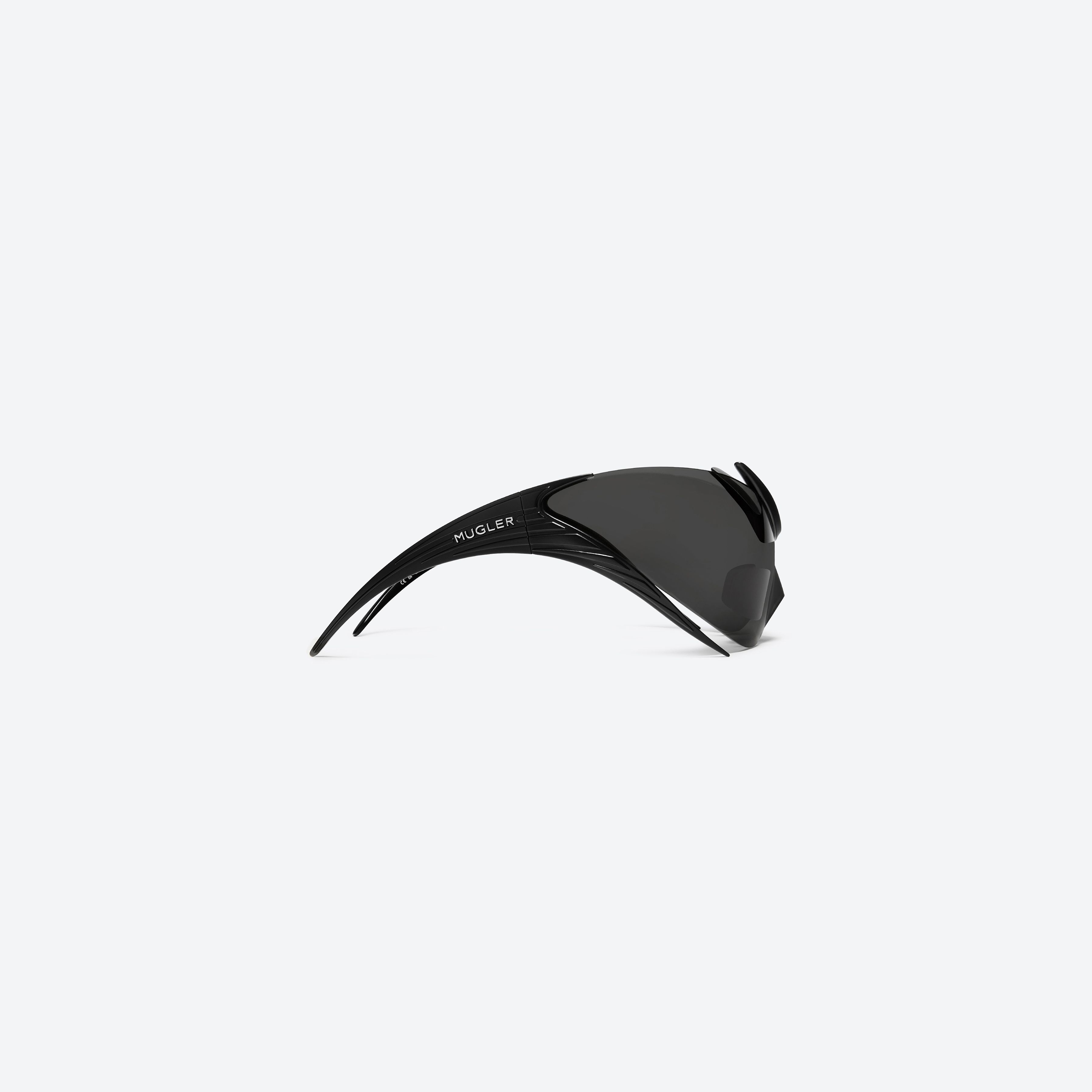 A detailed right view of Gentle Monster Mugler - Spiral 01 M01 Black Nylon framed Wraparound sunglasses.