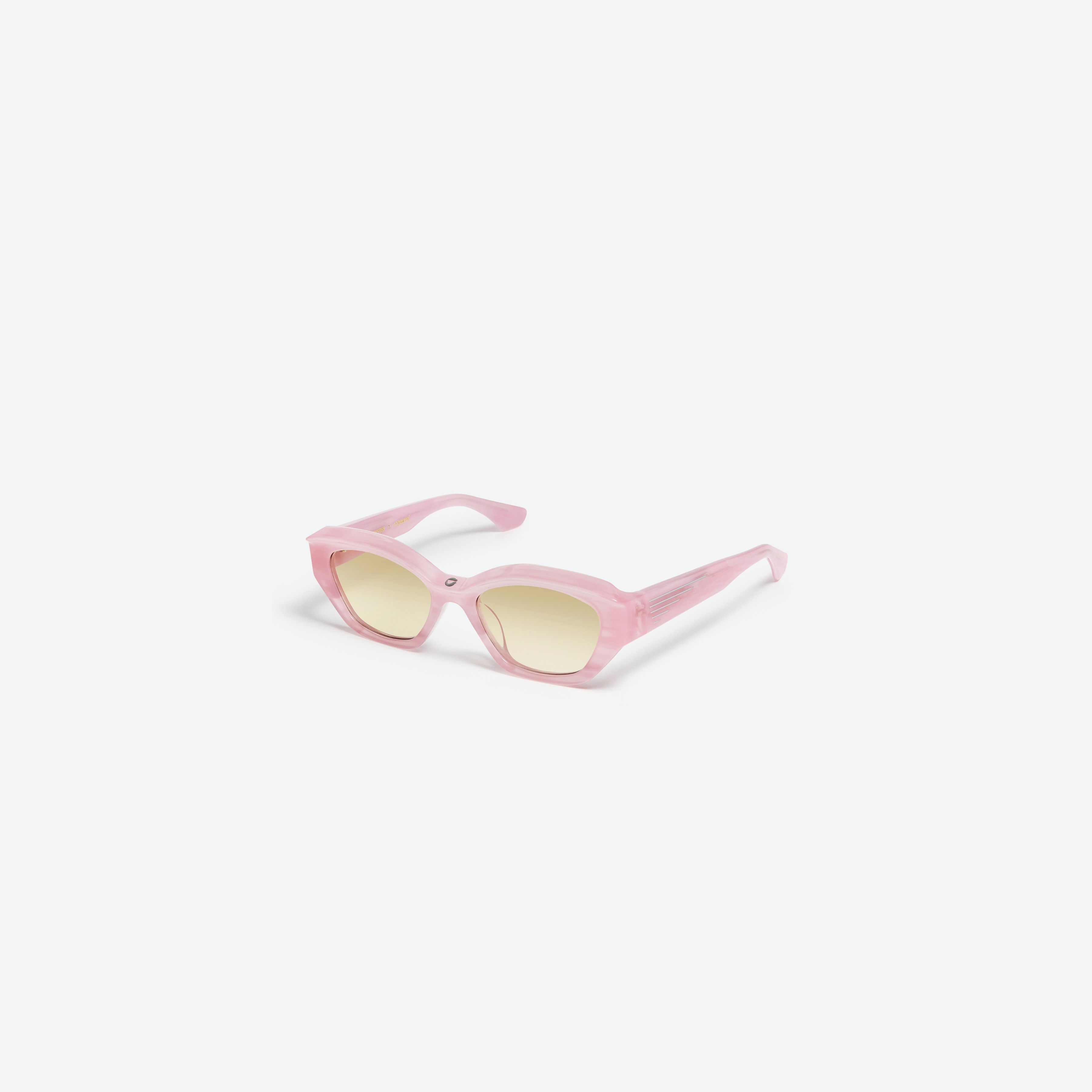 45-degree view of Gentle Monster Coperni - 5G P1 Pink Acetate framed Wraparound sunglasses.