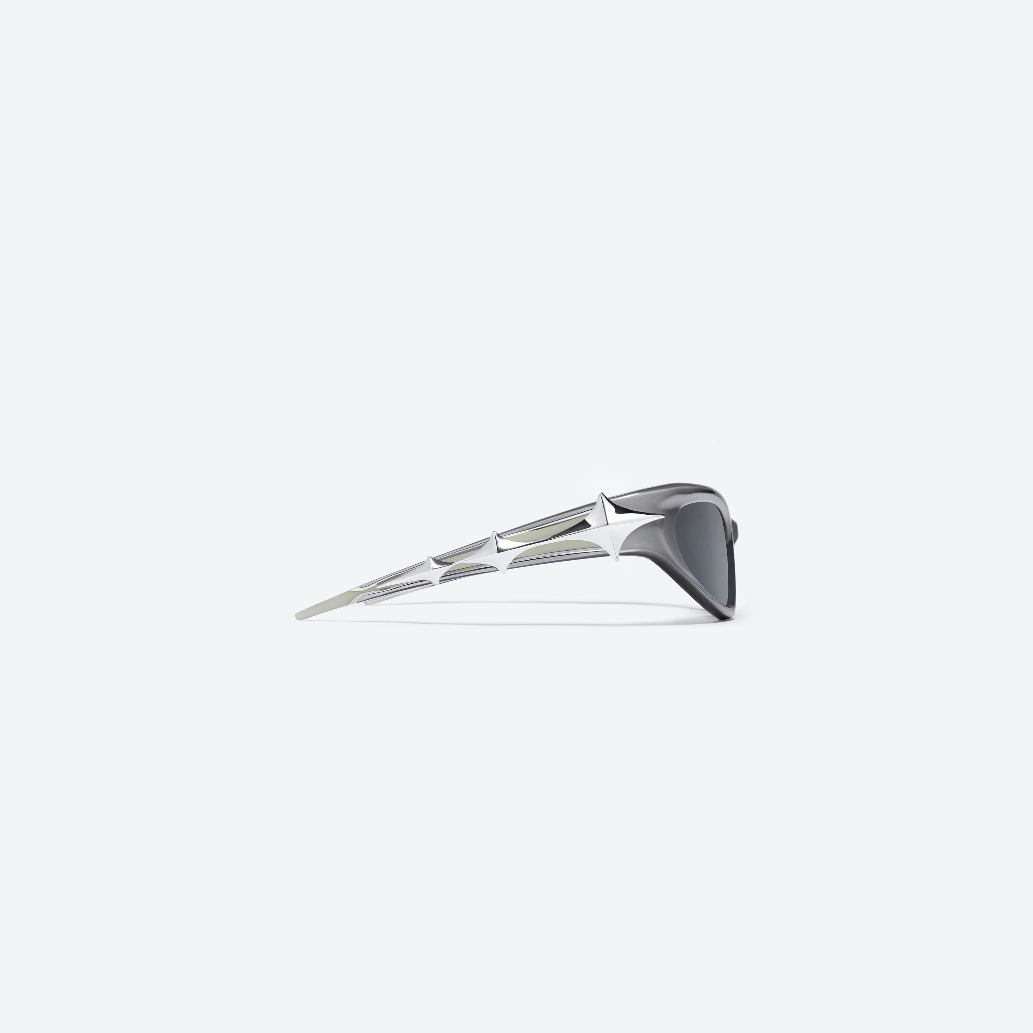 A detailed right view of Gentle Monster Paso G4 Similar Gray Acetate framed Wraparound sunglasses.