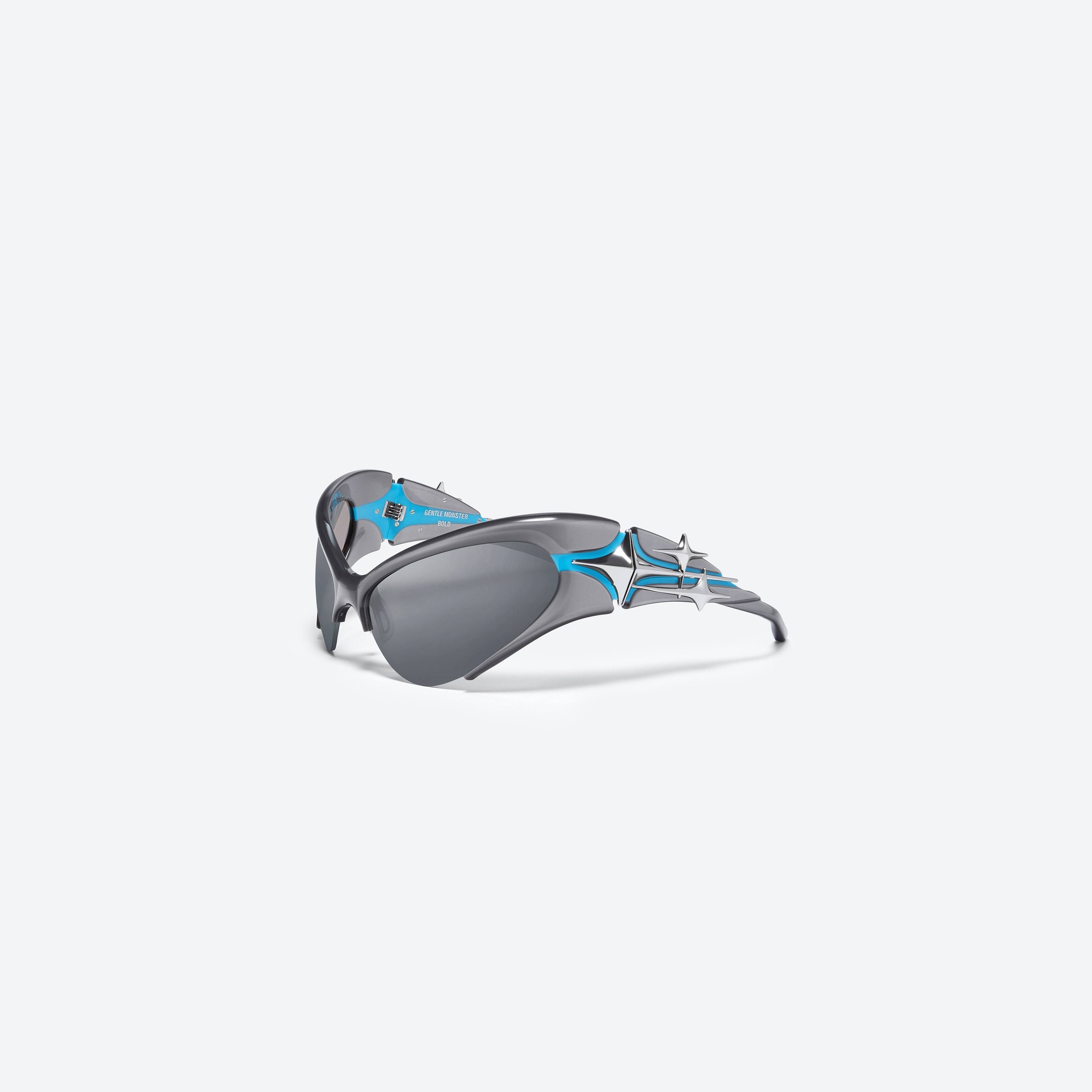 45-degree view of Gentle Monster Bree G4 Gray Acetate framed Wraparound sunglasses.