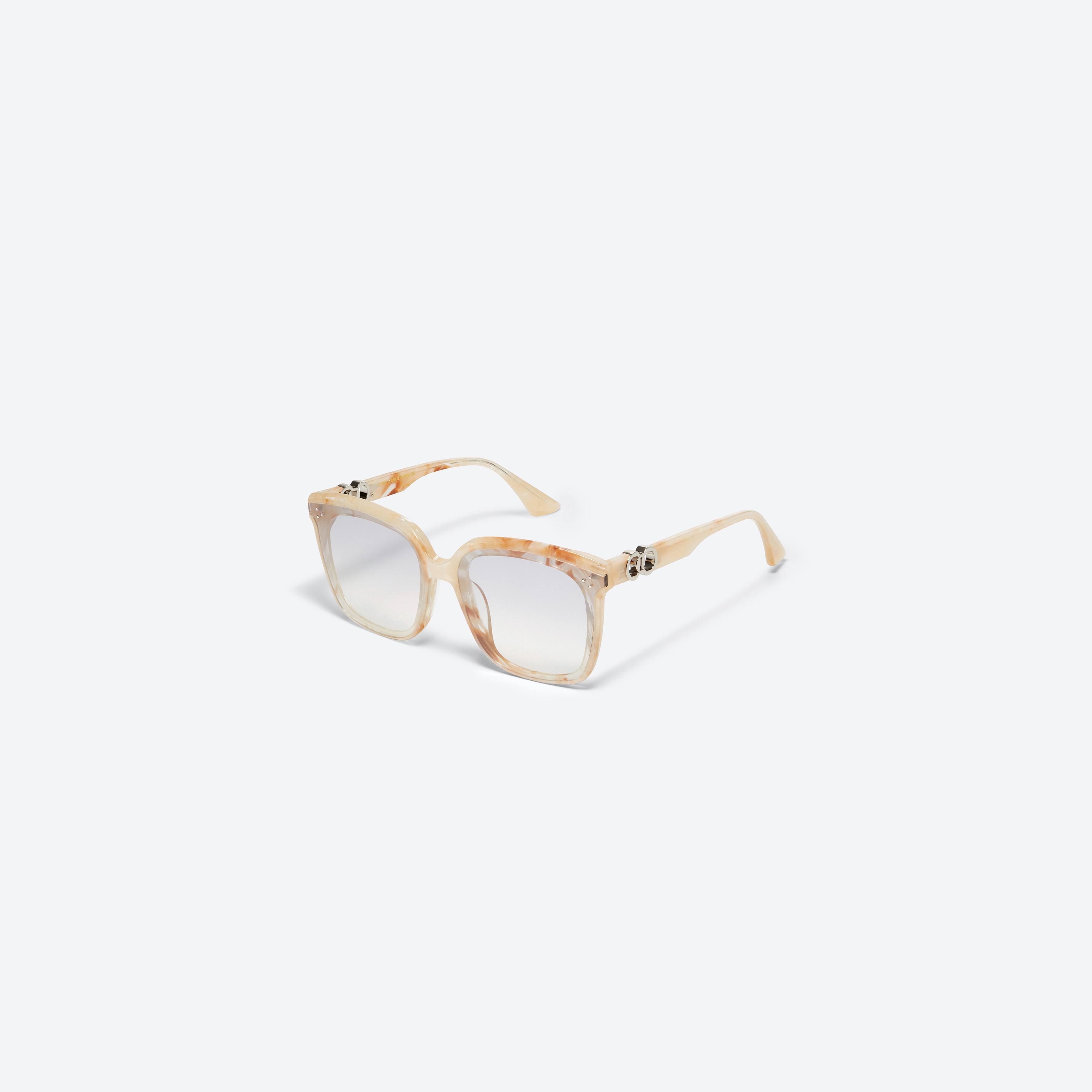 45-degree view of Gentle Monster Jennie - Angel BEC1 Ivory Mixed framed Square sunglasses.