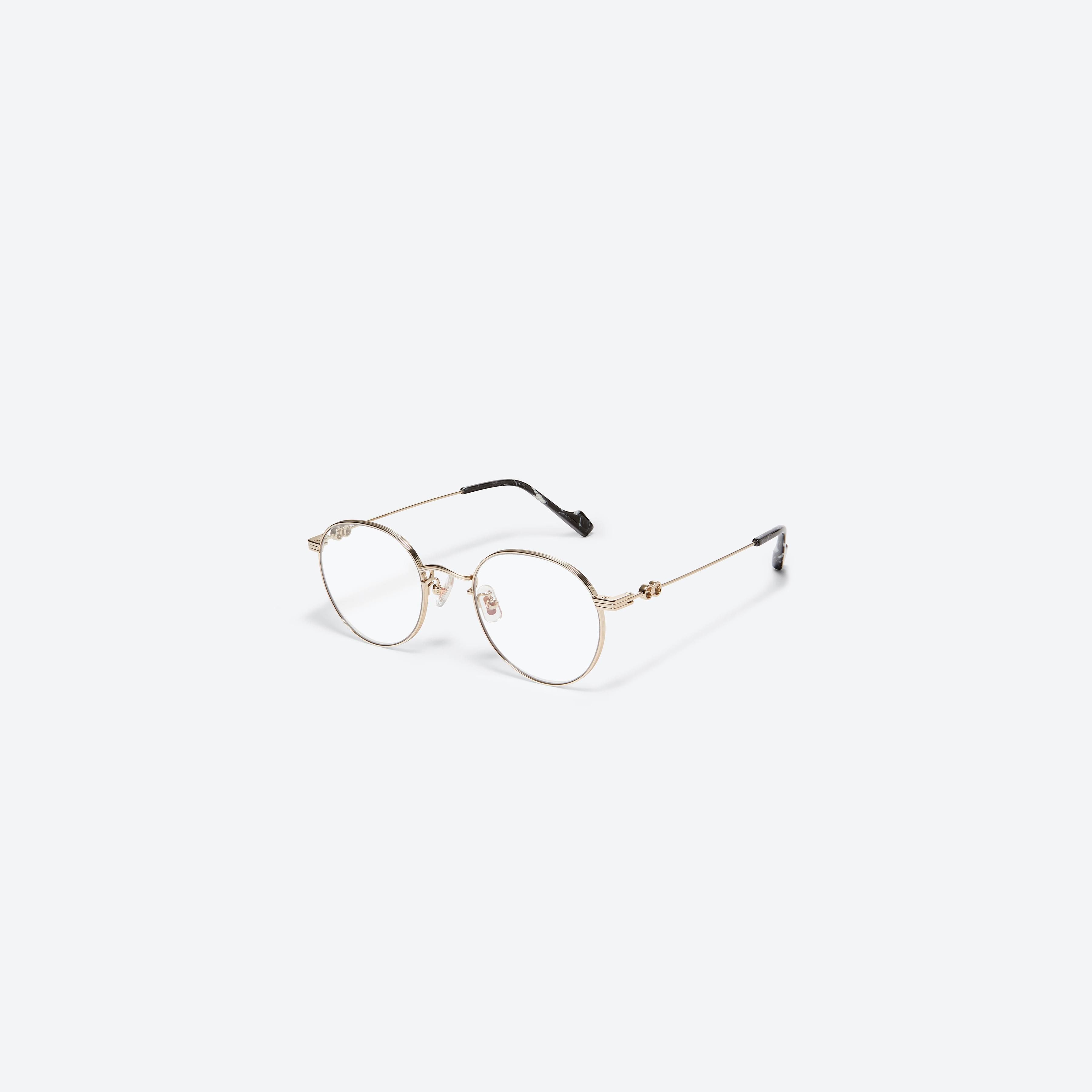 45-degree view of Gentle Monster Jennie - Cloudy Day Only 031 Gold Metal framed Round glasses.