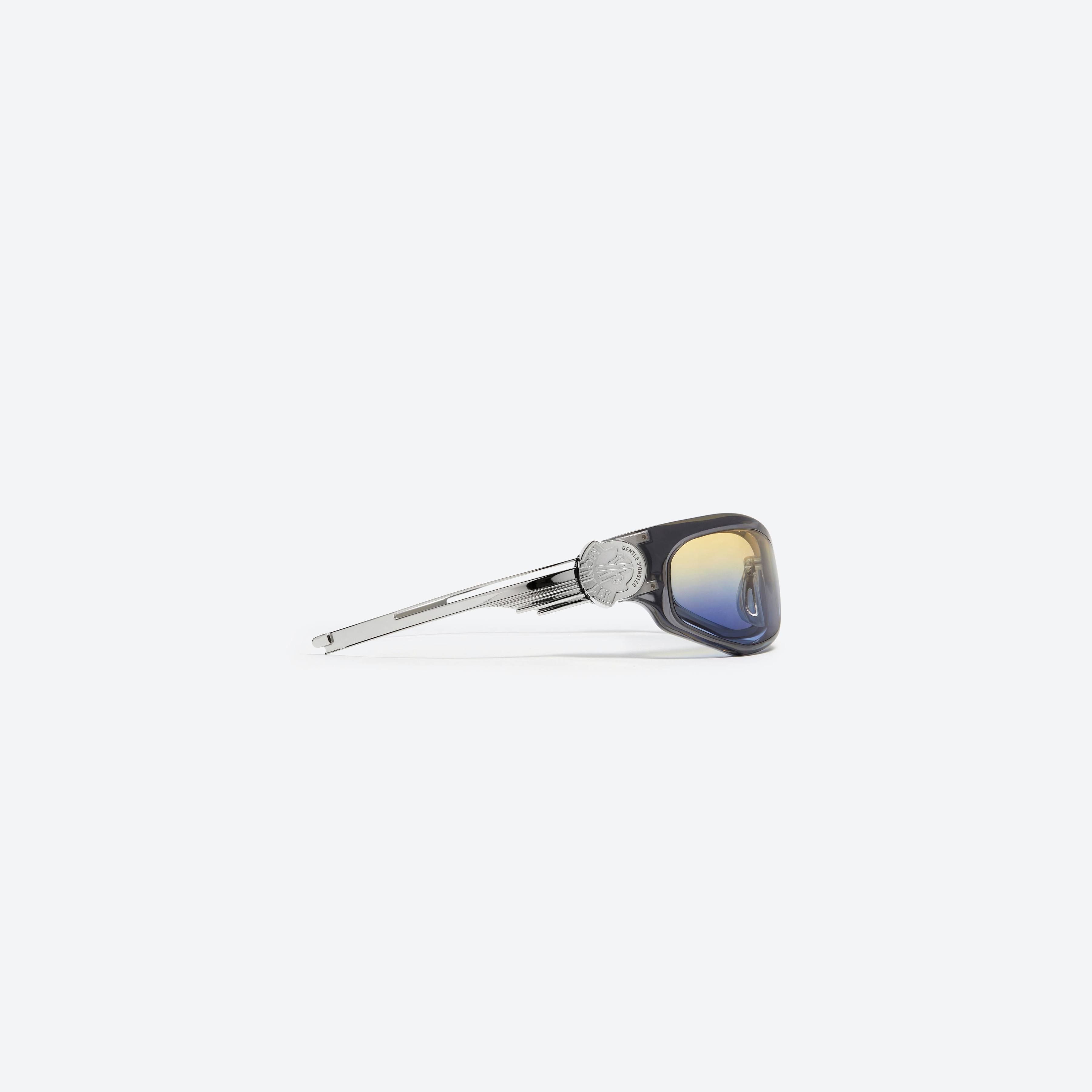 A detailed right view of Gentle Monster Moncler - Swipe 1 G1 Gray Mixed framed Wraparound sunglasses.