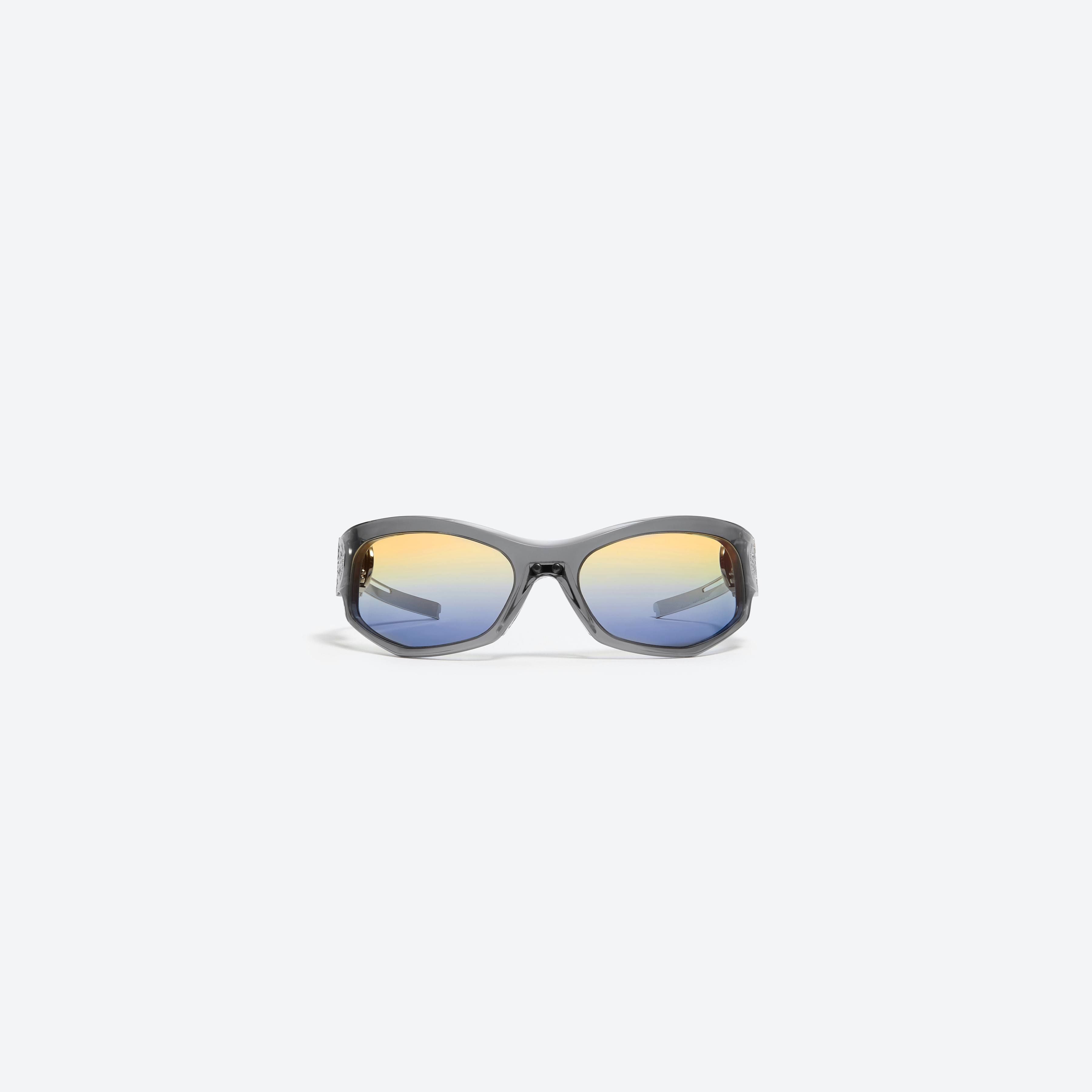 A front view of Gentle Monster Moncler - Swipe 1 G1 Gray Mixed framed Wraparound sunglasses.