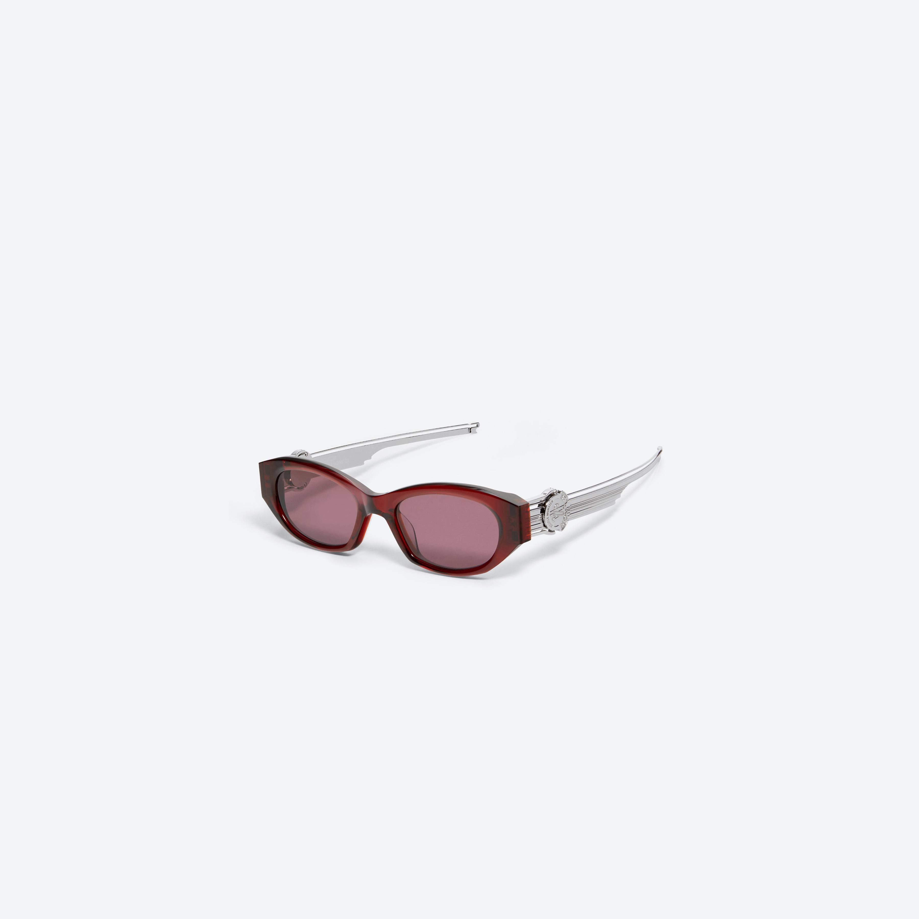 45-degree view of Gentle Monster Moncler - Swipe 2 RC3 Red Mixed framed Cat-eye sunglasses.