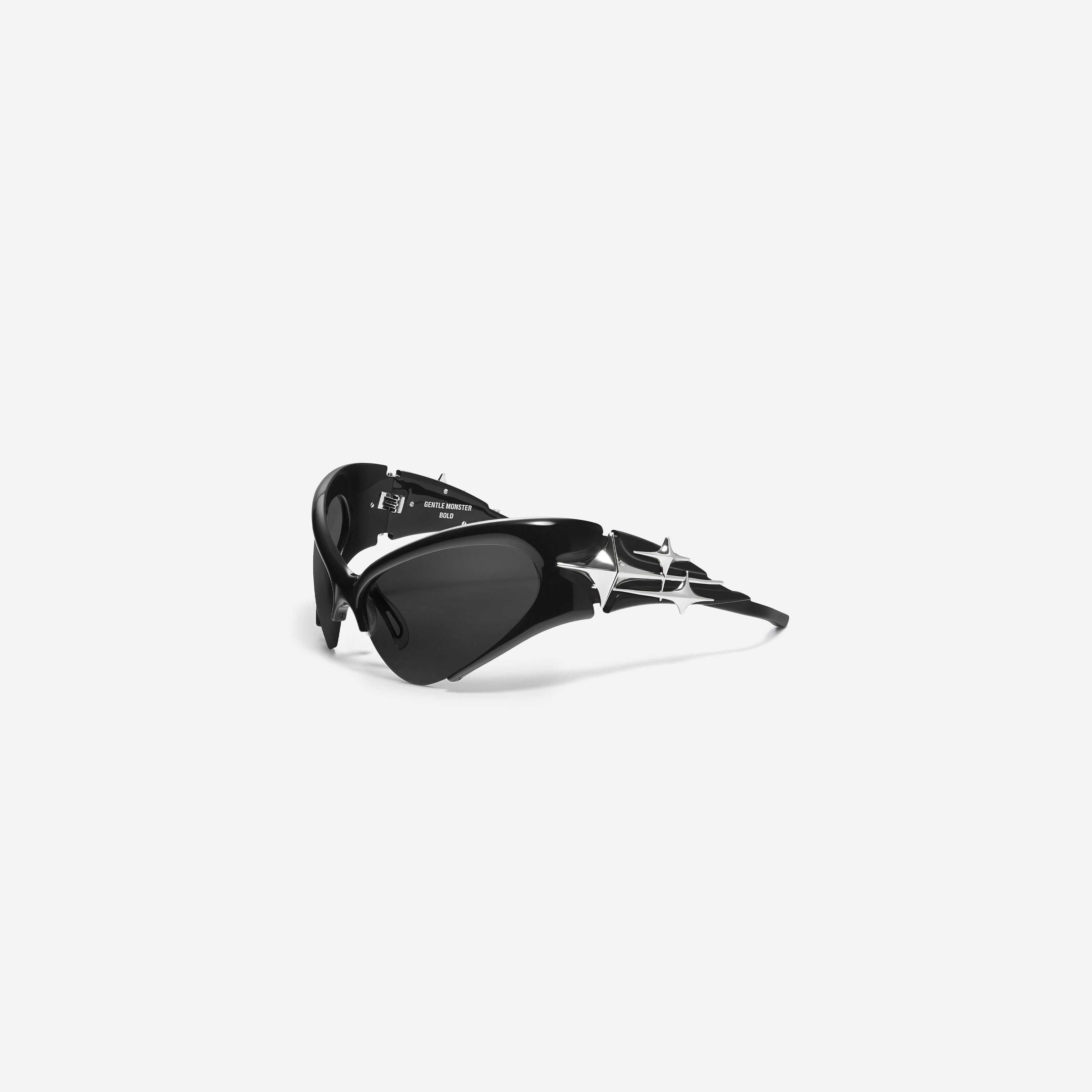 45-degree view of Gentle Monster Bree 01(BK) Black Acetate framed Wraparound sunglasses.
