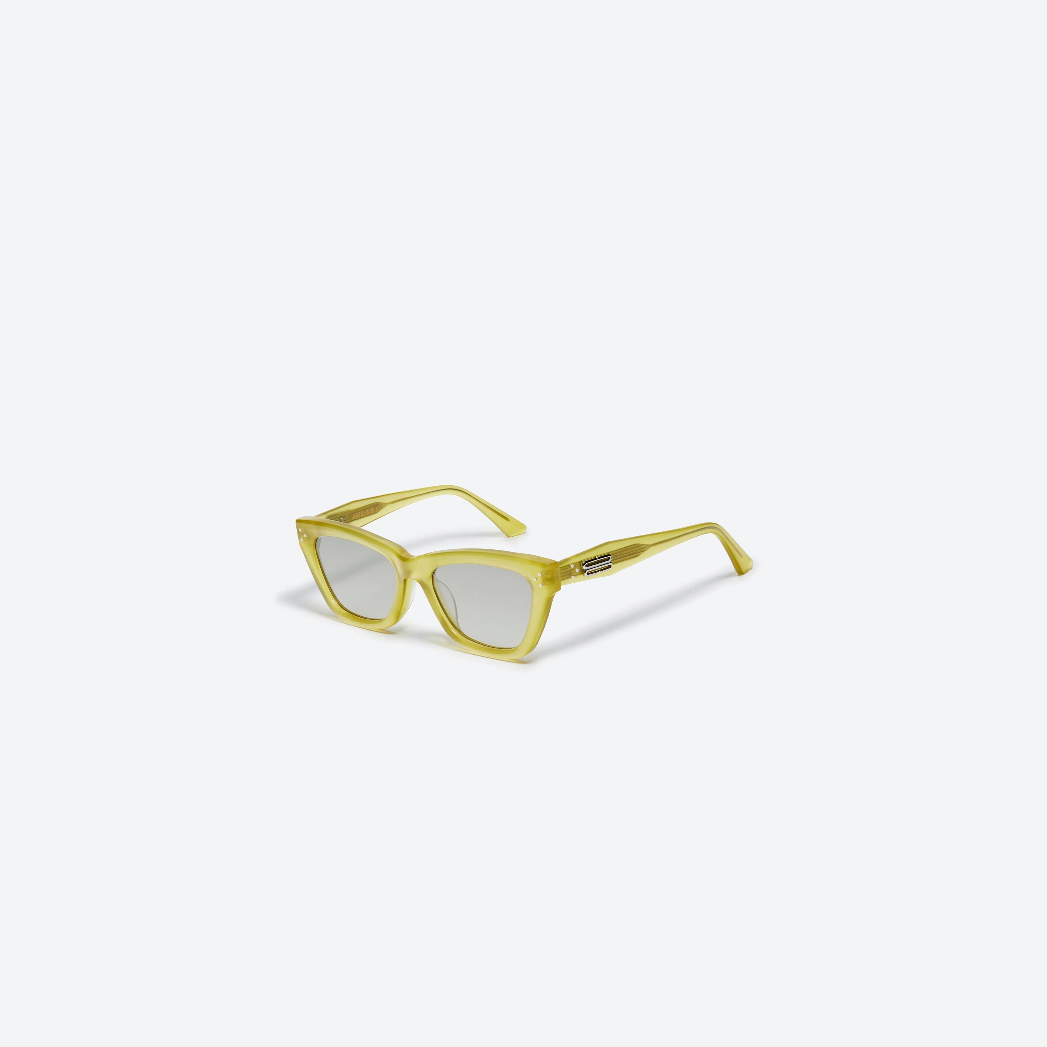 45-degree view of Gentle Monster Milo OL3 Green Acetate framed Cat-eye sunglasses.