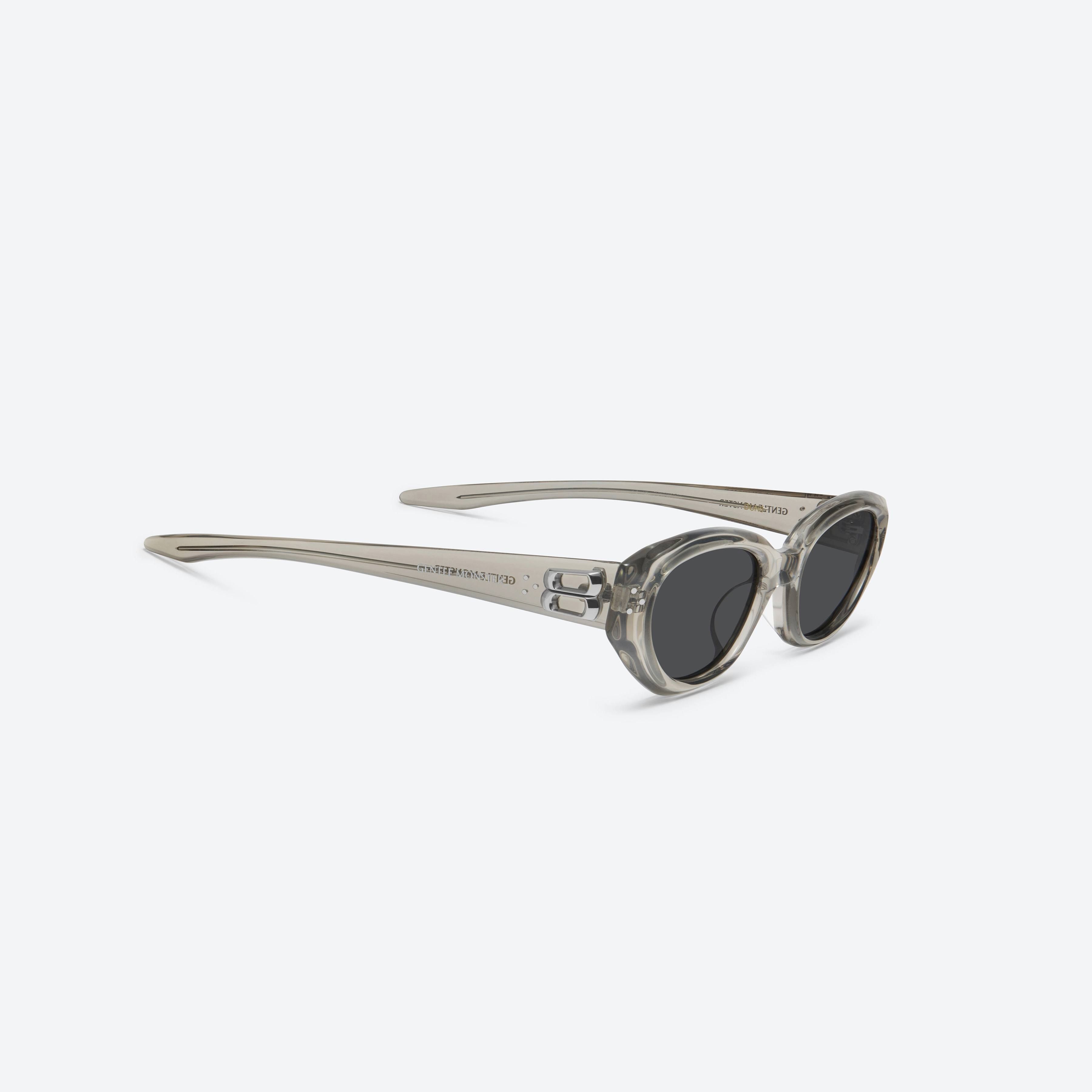 45-degree detailed view of Gentle Monster DUNS BRC11 Brown Acetate framed Oval sunglasses.