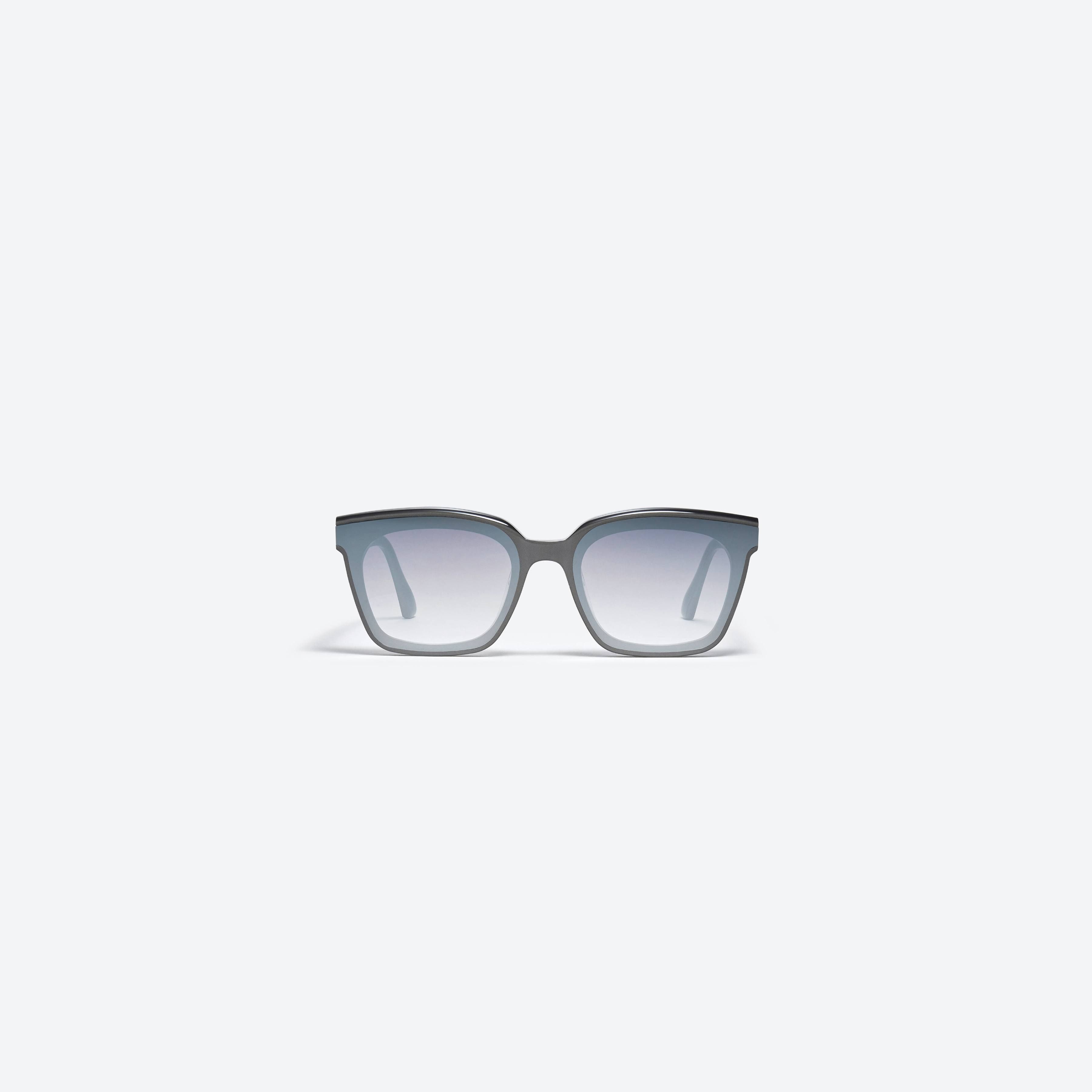 A front view of Gentle Monster Moncler - Swipe 3 G5 Gray Mixed framed Square sunglasses.