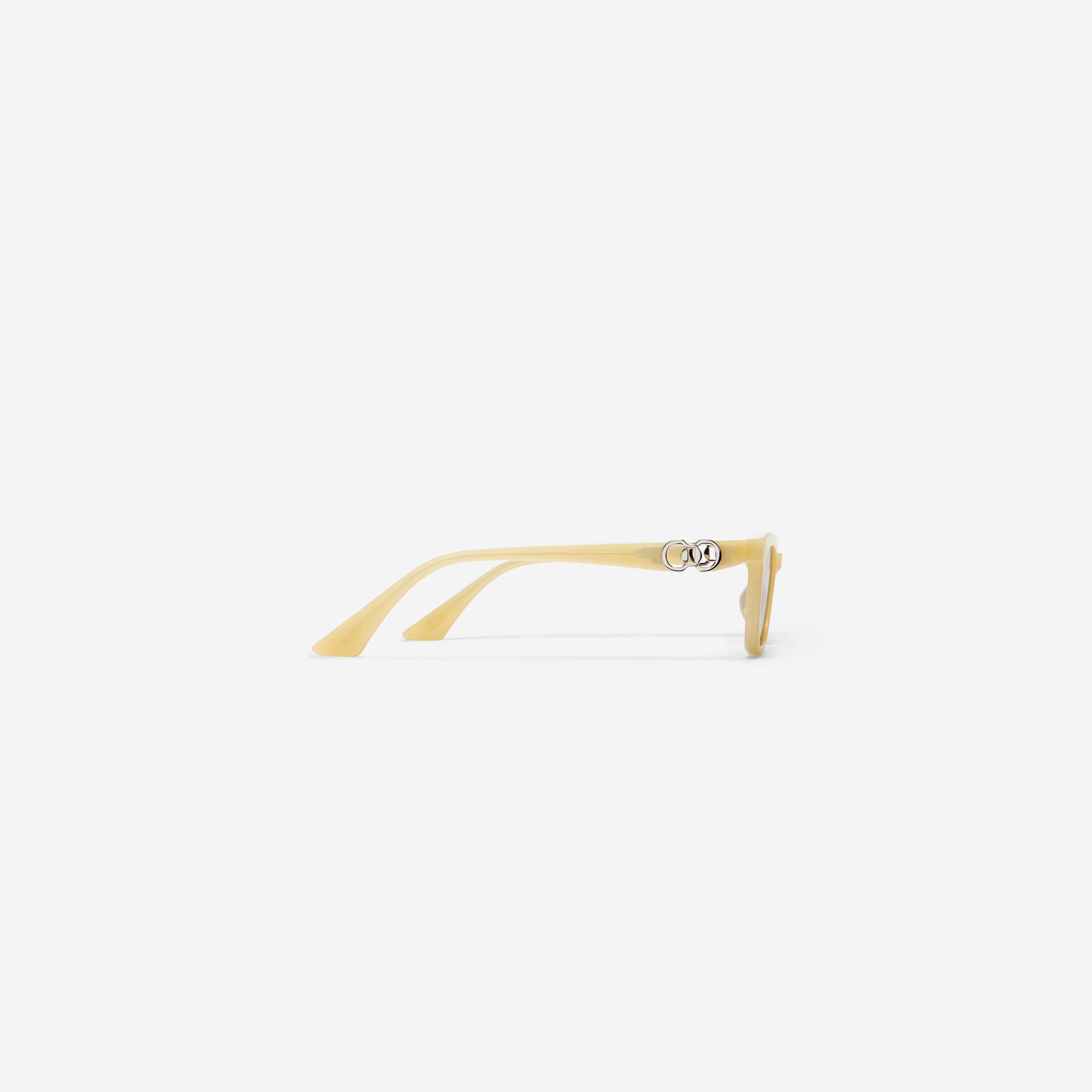 A detailed right view of Gentle Monster Jennie - XOXO Y1 Yellow Mixed framed Square sunglasses.