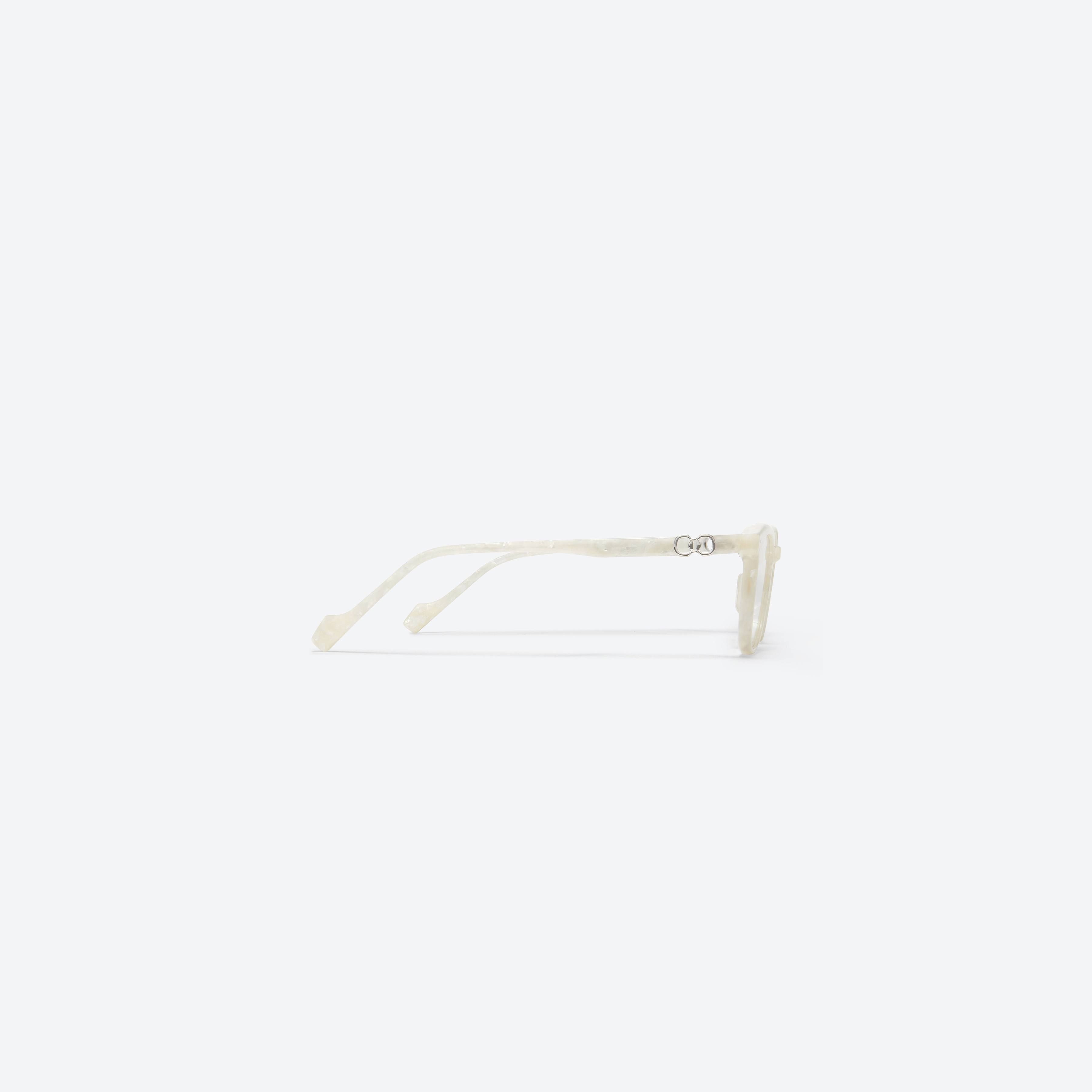 A detailed right view of Gentle Monster Jennie - Zen WD2 White Mixed framed Square glasses.